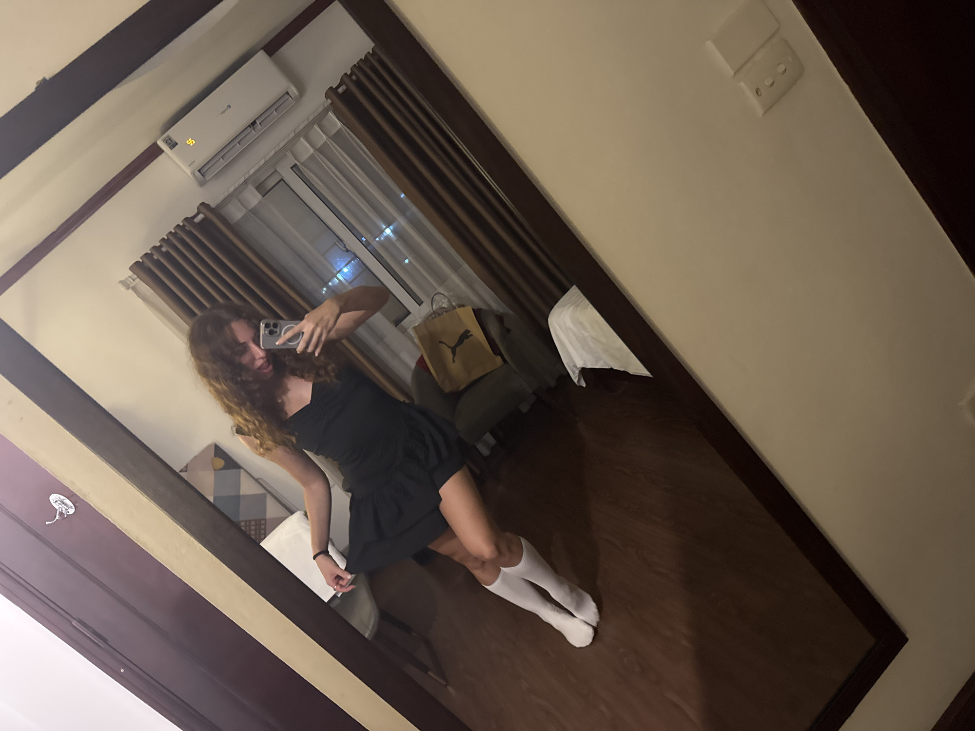 Mirror and elevator selfies in a Hà Nội interior