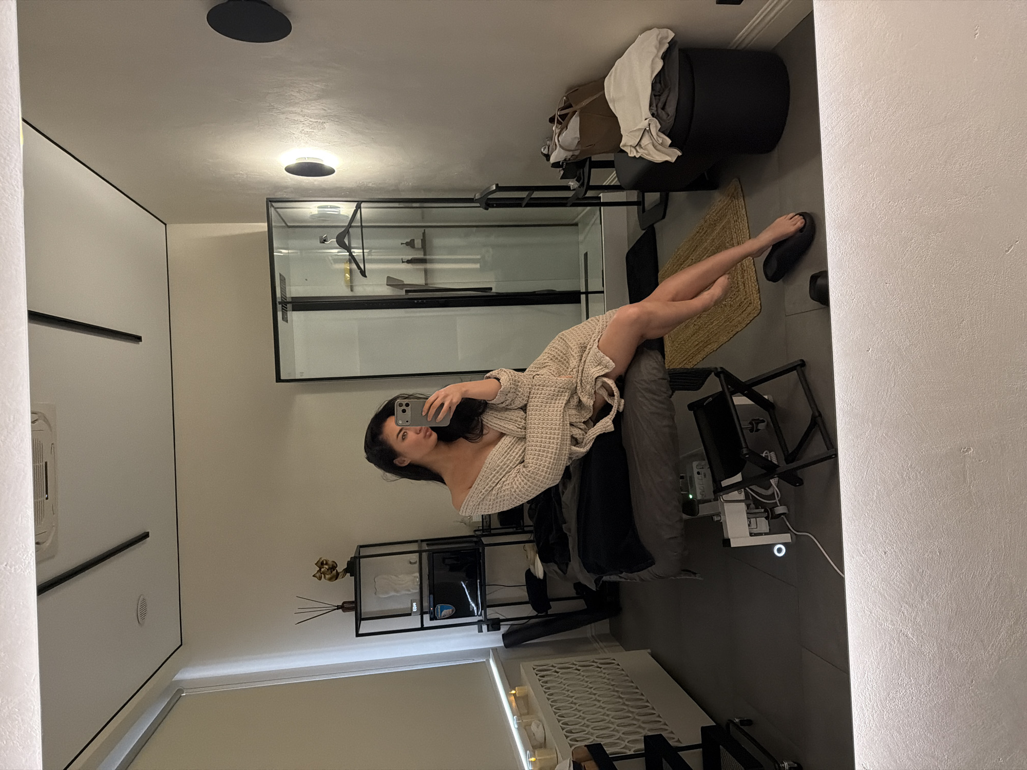 Woman photographed in two Moscow interior settings Monday morning