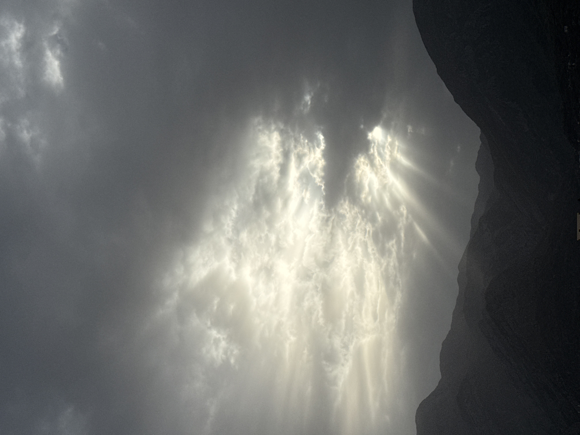 Dramatic sunrise captured over Montenegro mountains amid overcast conditions