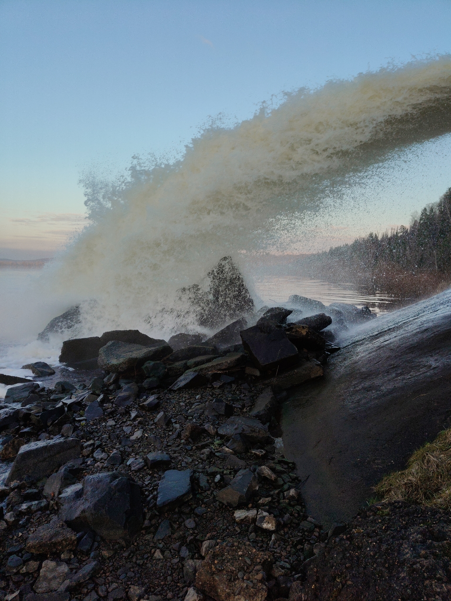 Witnesses capture shoreline waves, street scenes during afternoon hours
