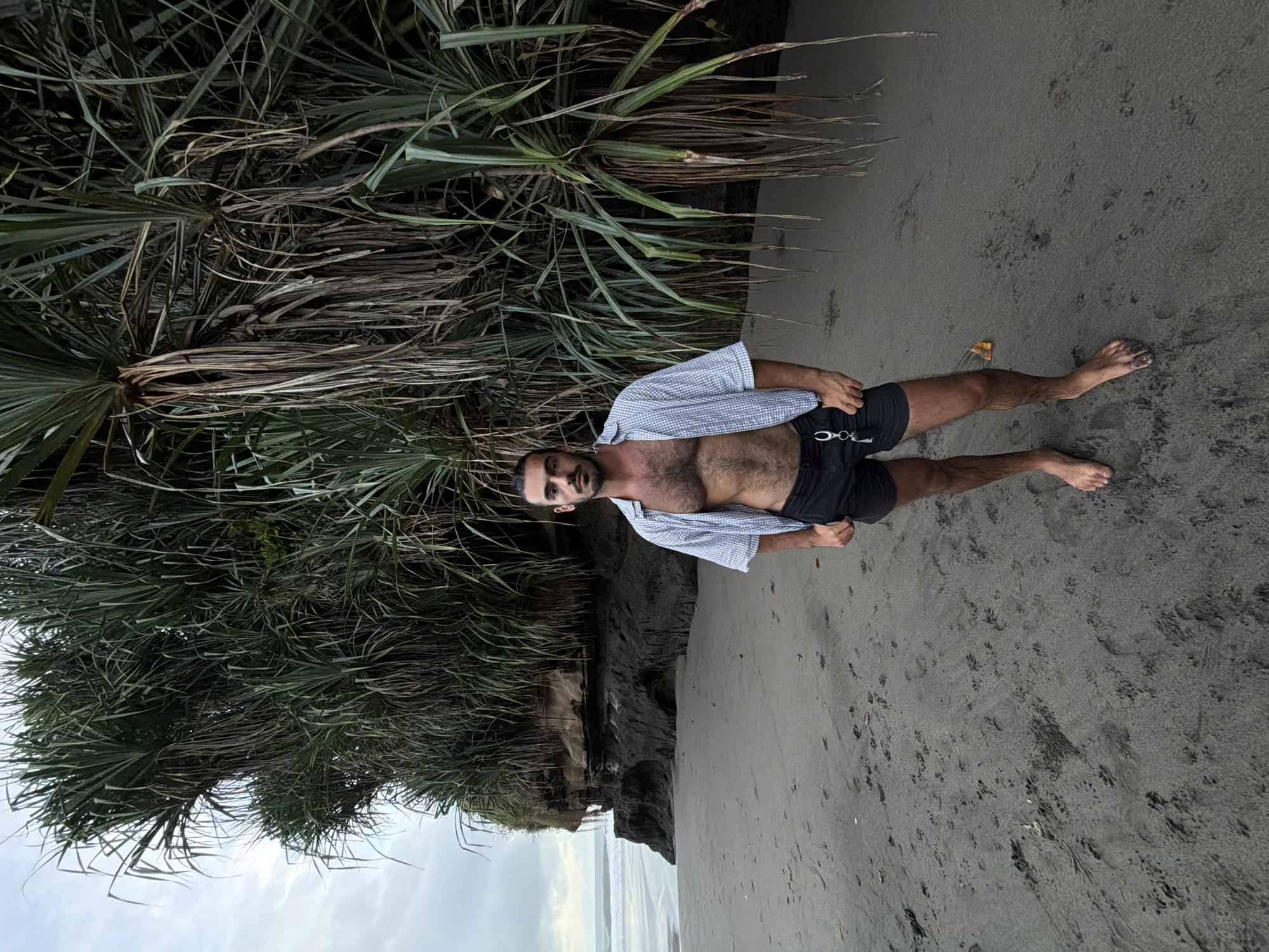 Morning beach activities documented at Selemadeg's black sand coast