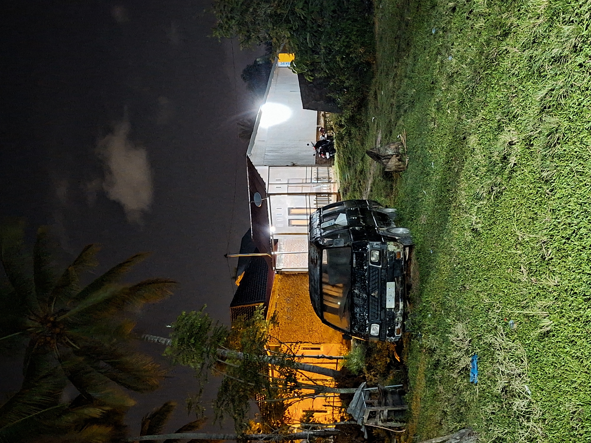 Ordinary life moments captured in Lhokseumawe: damaged van, mangoes, cat