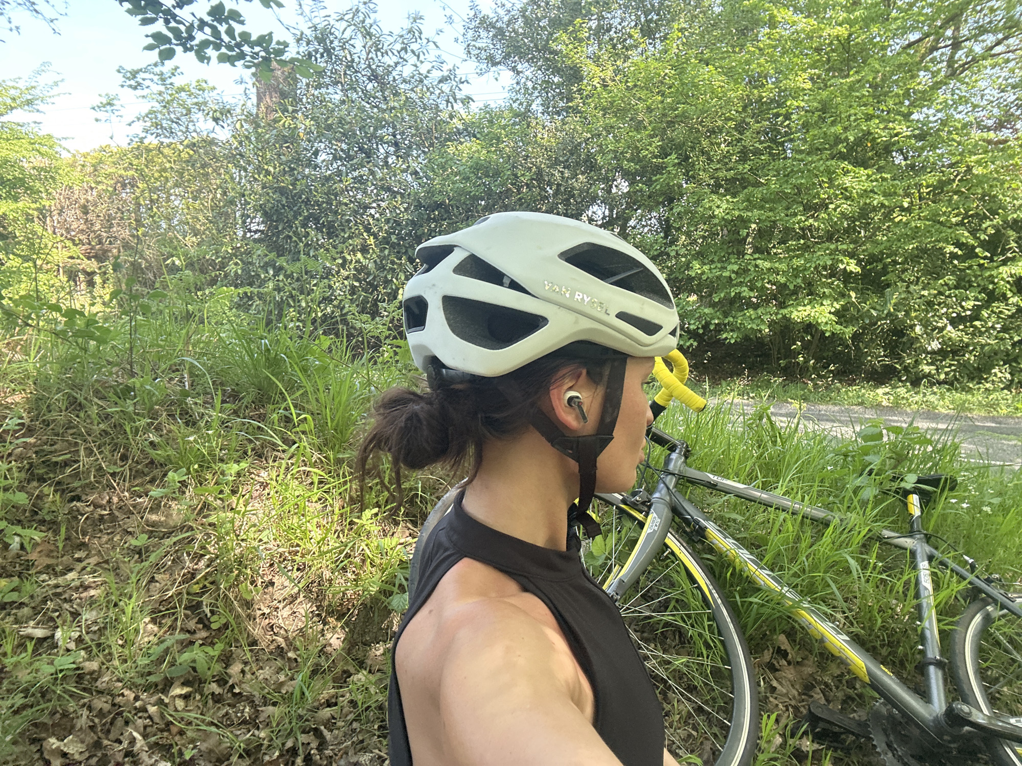 Cyclist takes roadside break in Wealden countryside