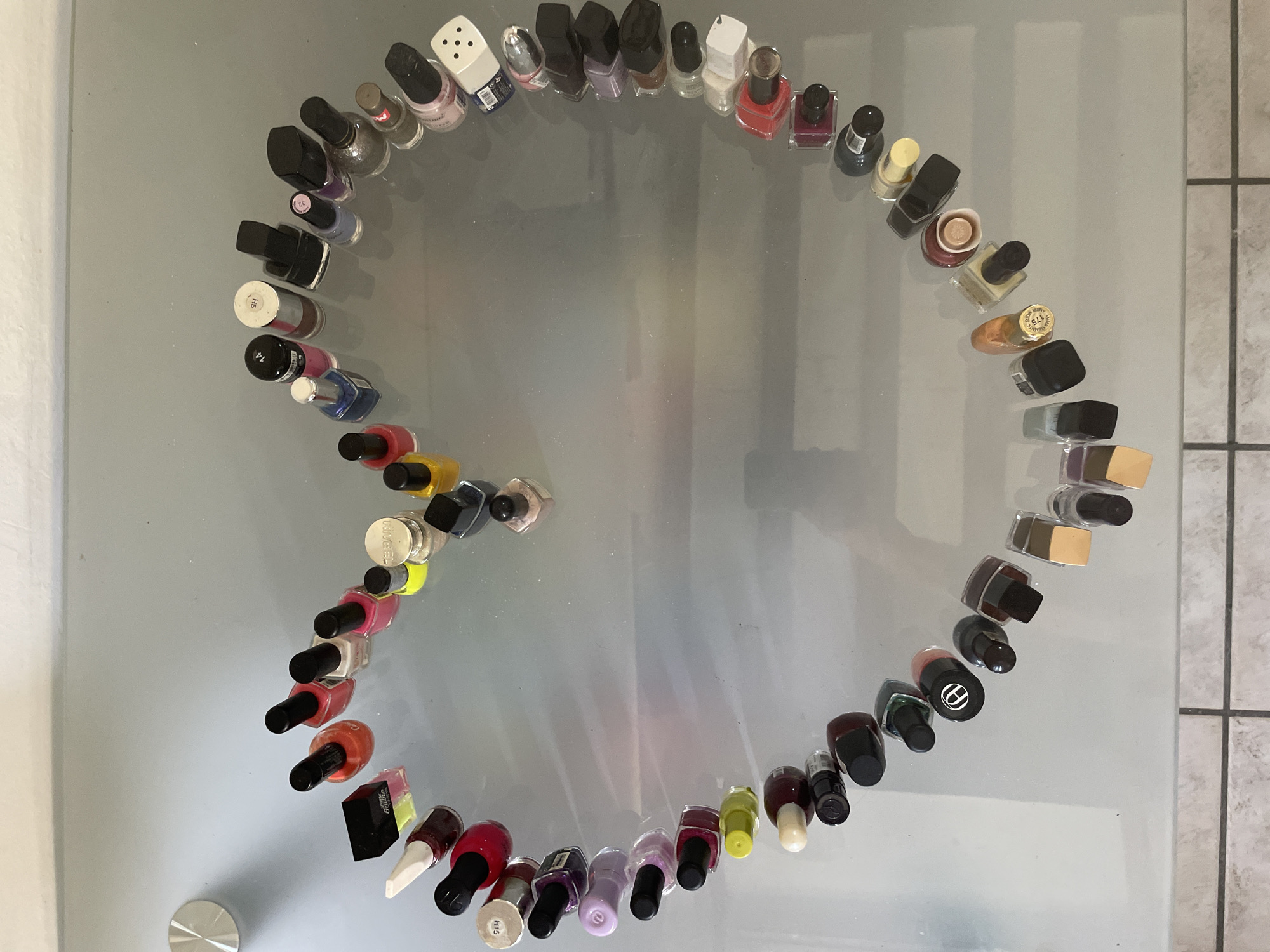 Afternoon street life and a nail polish display in Pescia