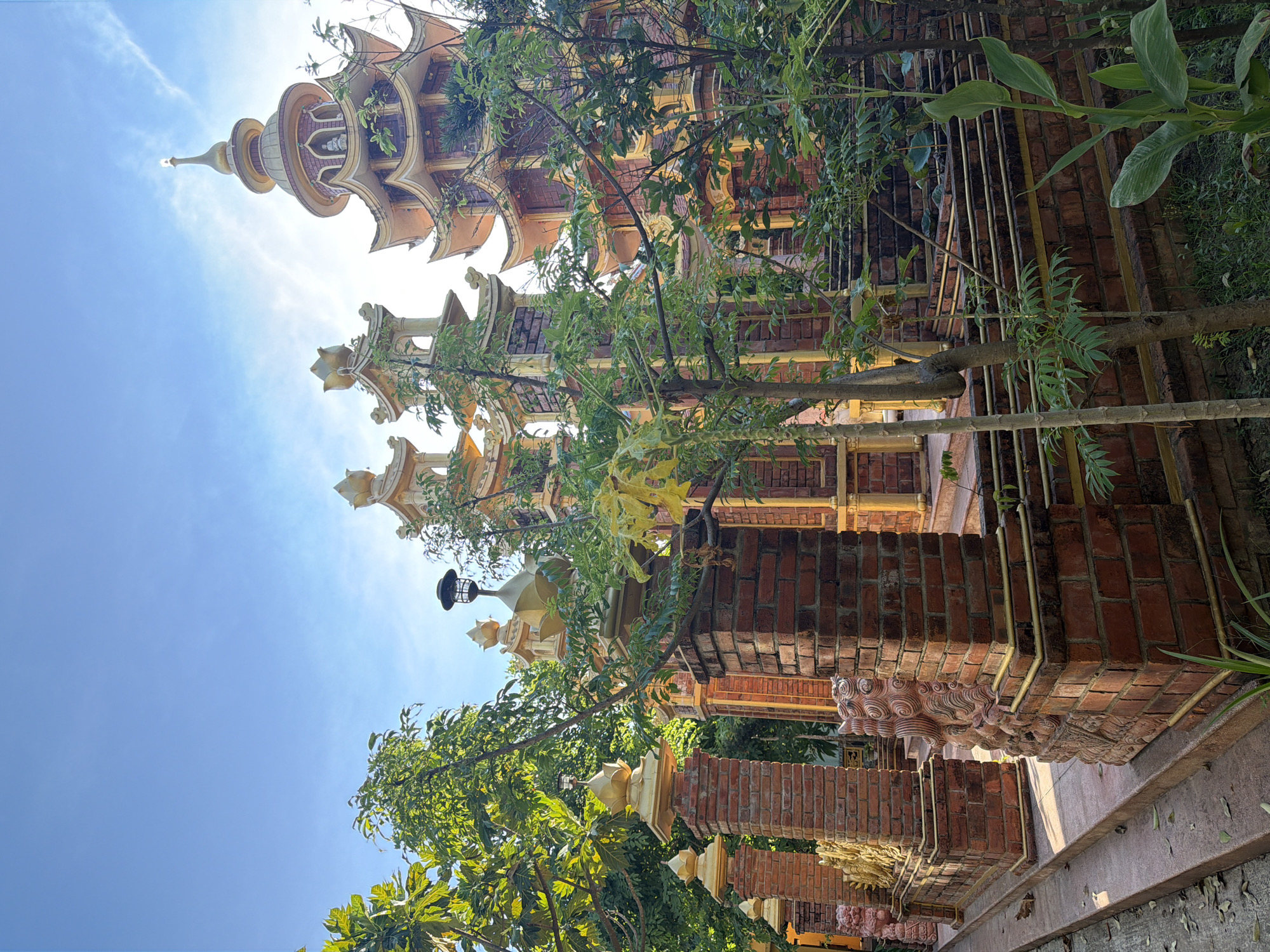 Tourist documents Buddhist temple visit in Đà Nẵng, Vietnam