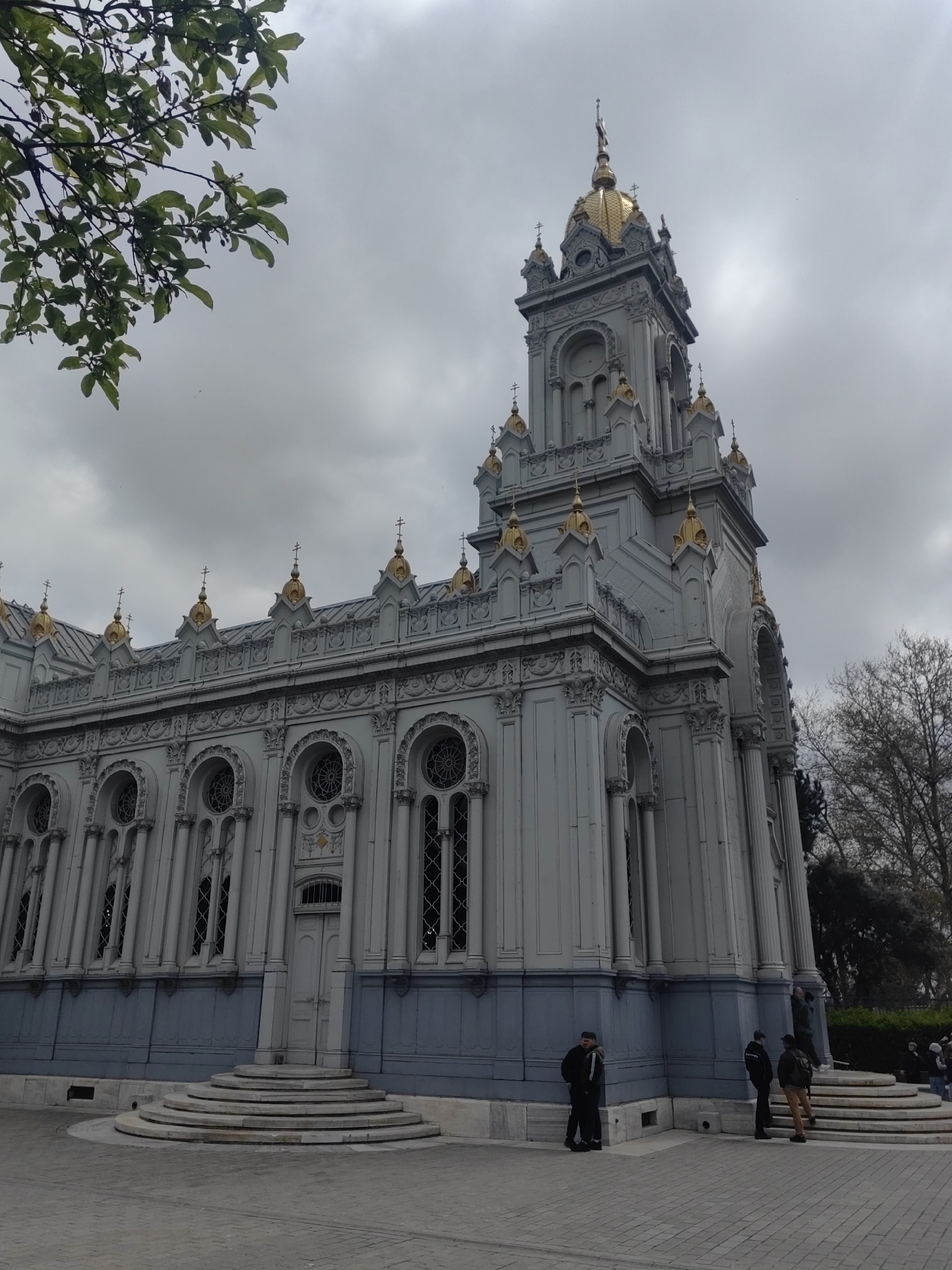 Ornate church building documented in Istanbul under overcast skies