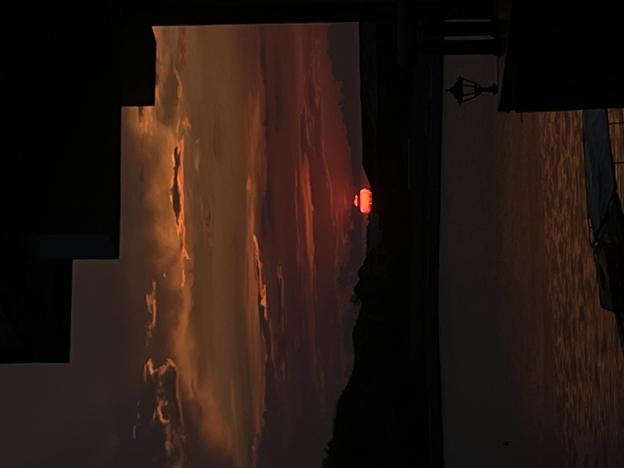 Spectacular sunset draws witnesses to waterfront marina