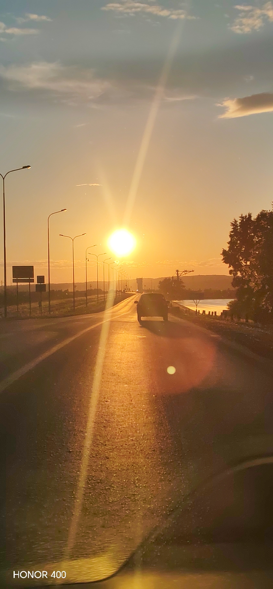 Sunset scenes documented across Chaikovsky, Russia roads