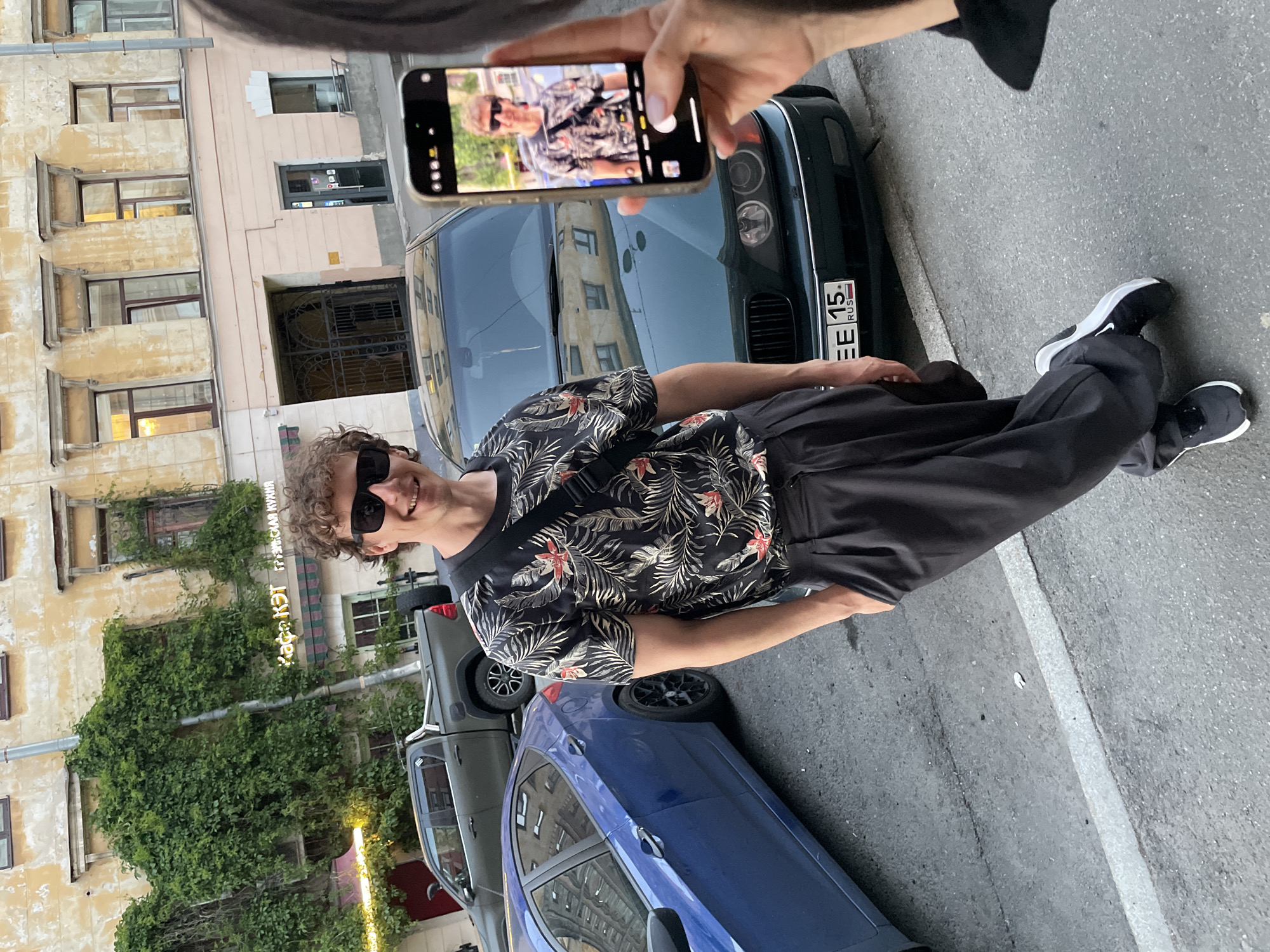 Couple documented during evening walk through central Saint Petersburg