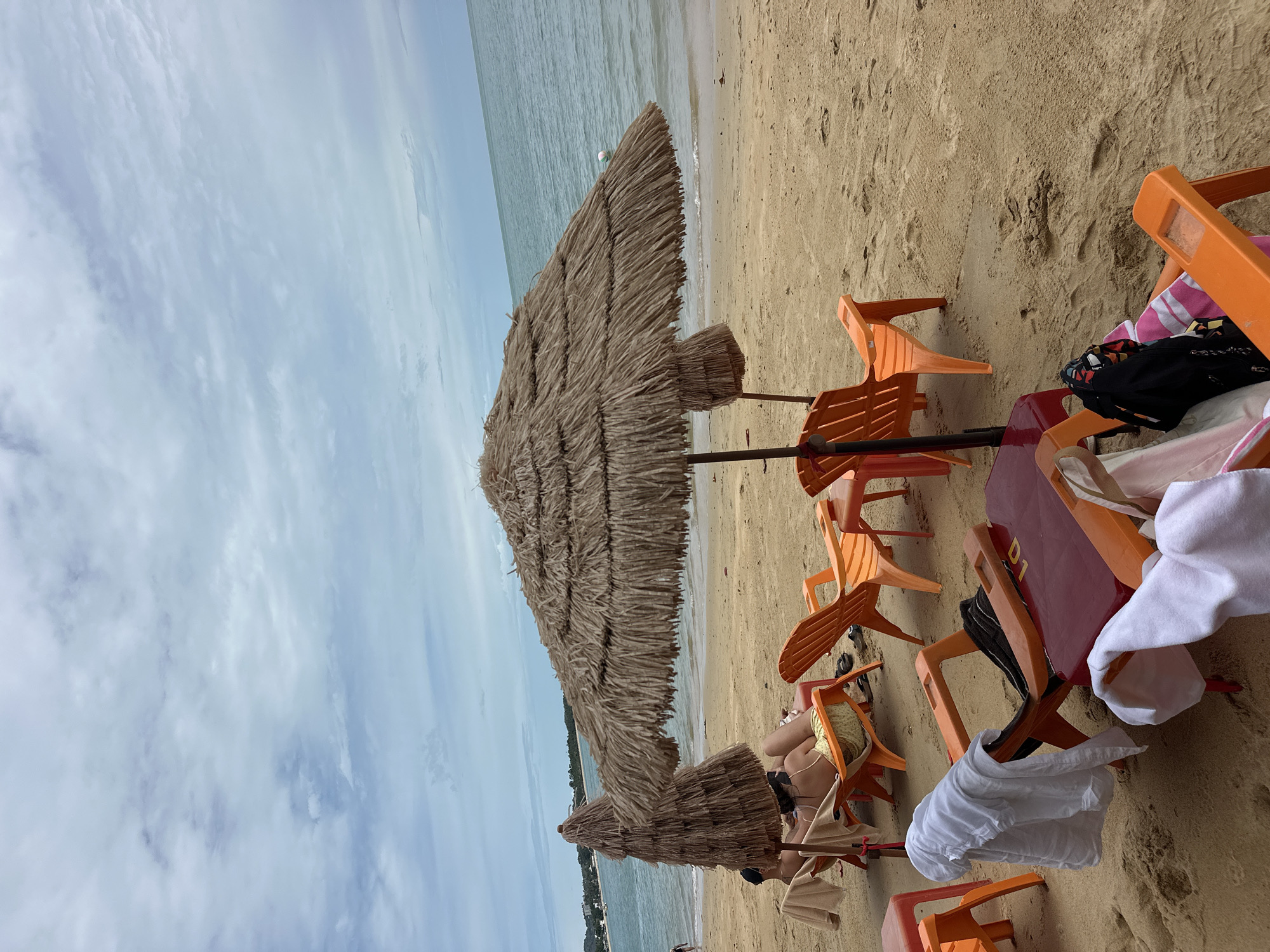 Laid-back Ko Samui beach with rentals, loungers, and calm water