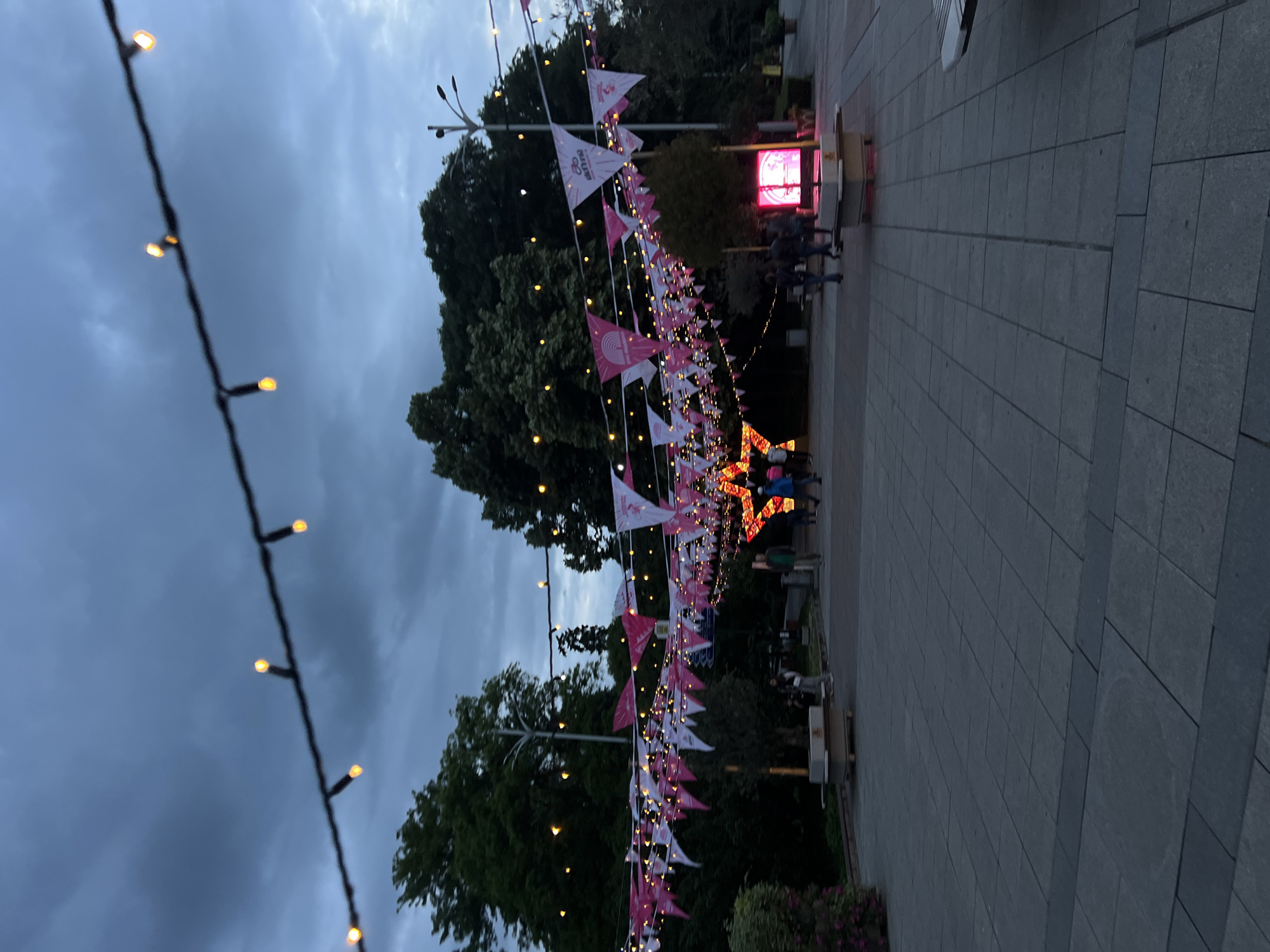 Festive decorations illuminate Plovdiv streets during evening celebration