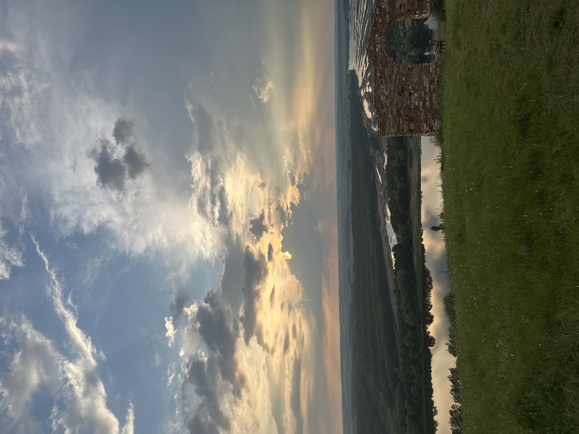 Sunset over a river valley from a hilltop in rural Russia