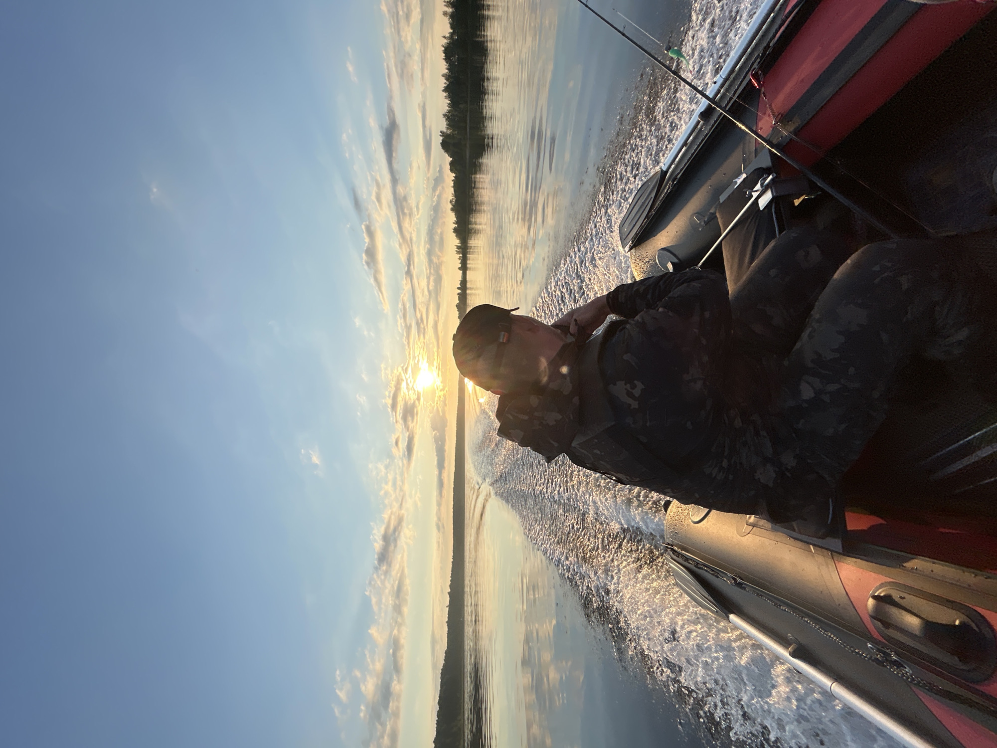 Solo boat ride at sunset on a Russian lake