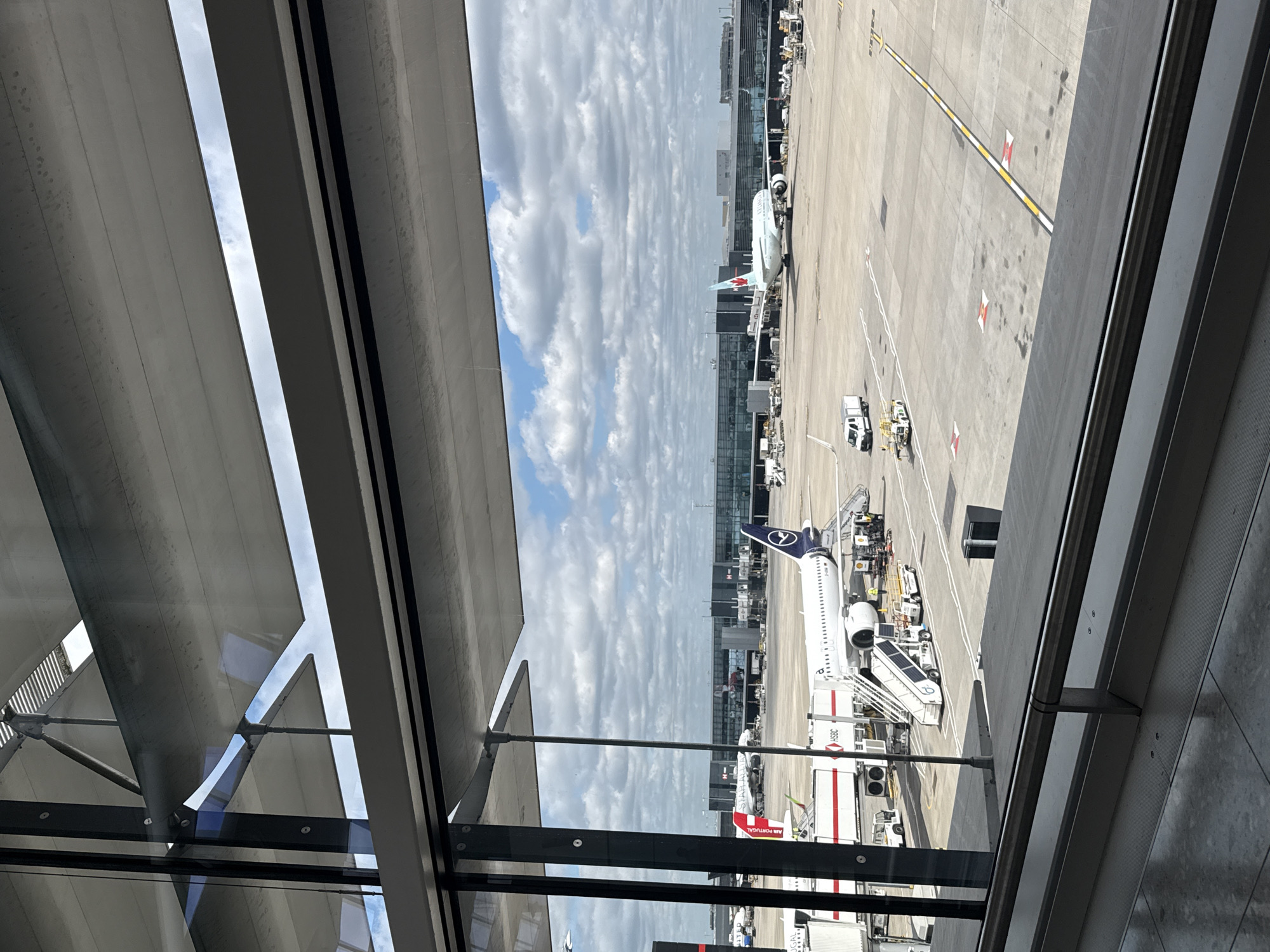 Aircraft visible on London airport tarmac during routine operations