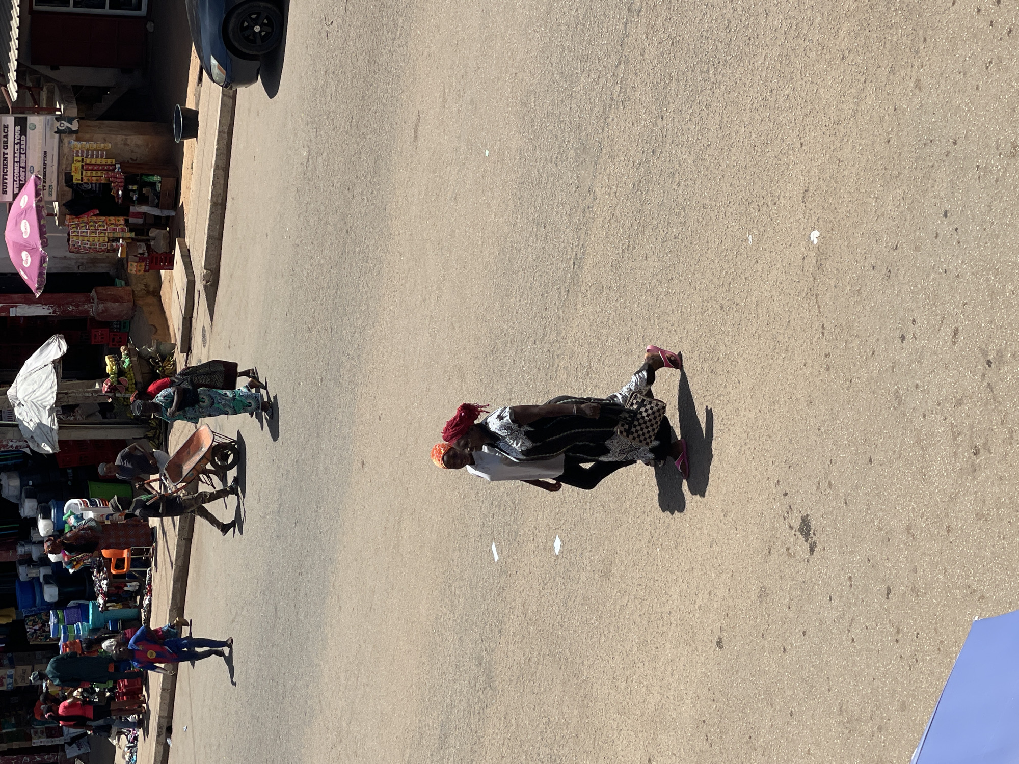 Everyday street life documented in Bukuru Nigeria commercial district