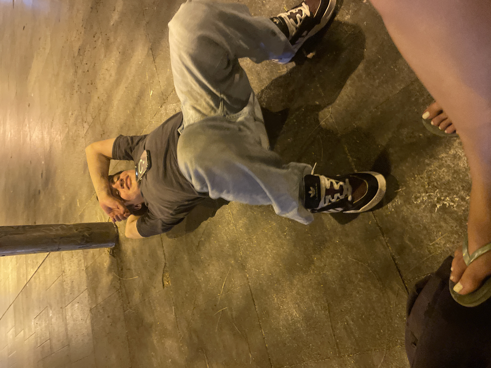 Late-night street hangout on a city plaza