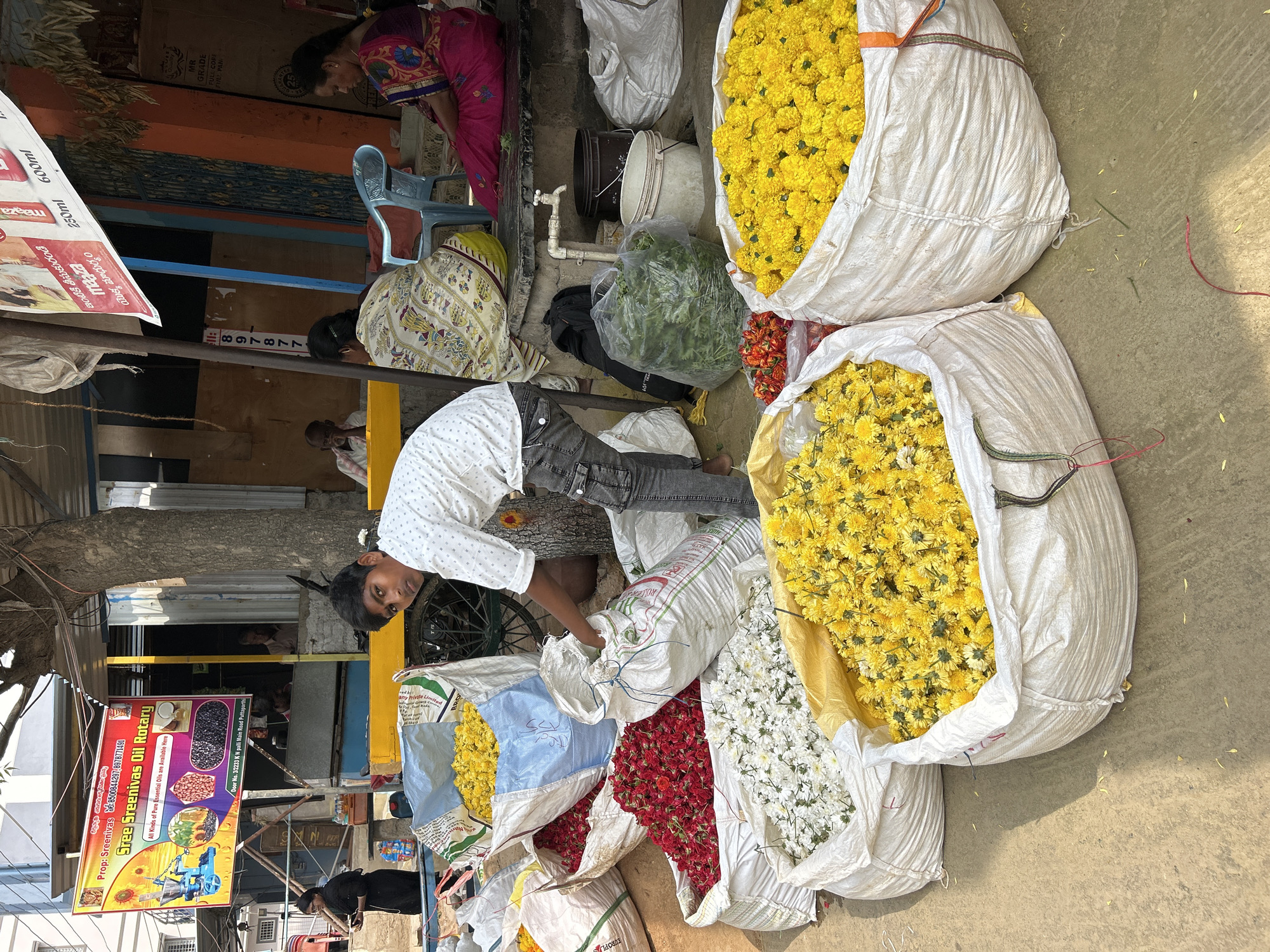 Morning street market activity observed in Puttaparthi, India