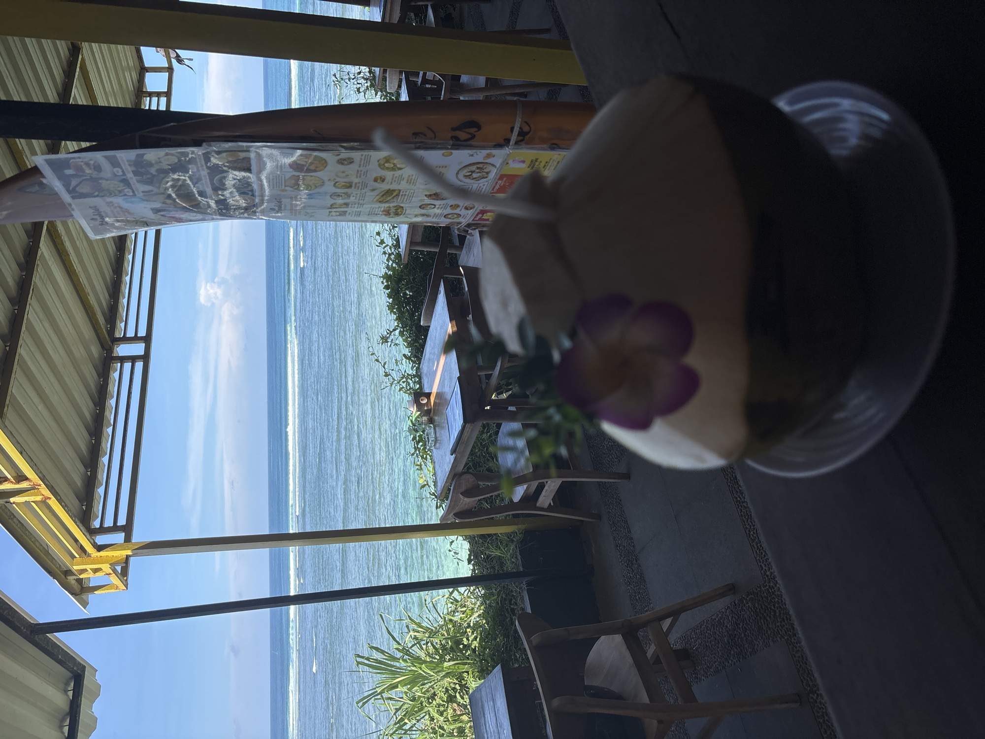 Early morning coconut drink enjoyed at Kuta Selatan beachside cafe