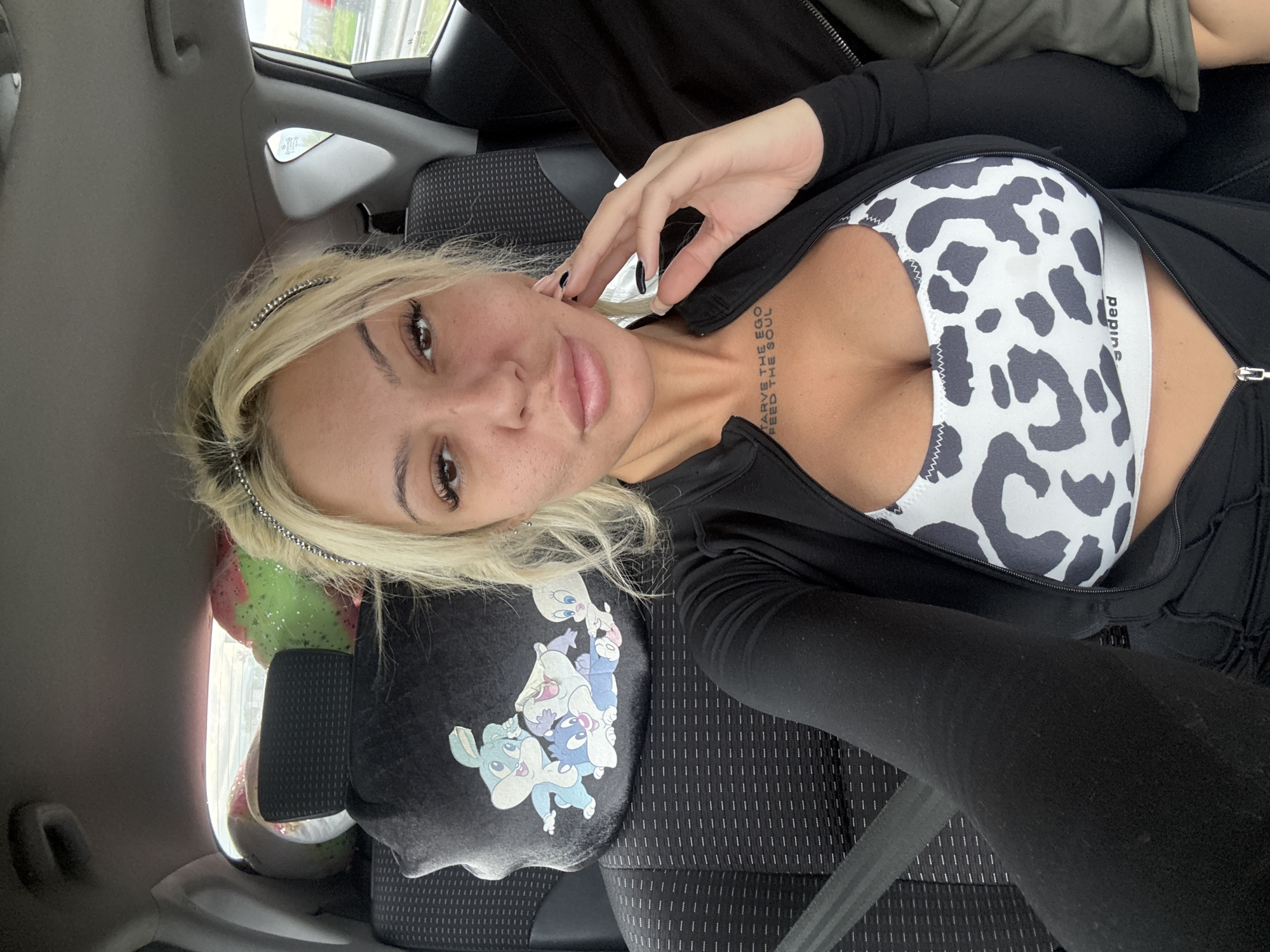 Woman photographed taking selfie in car, Shtarkovo Bulgaria