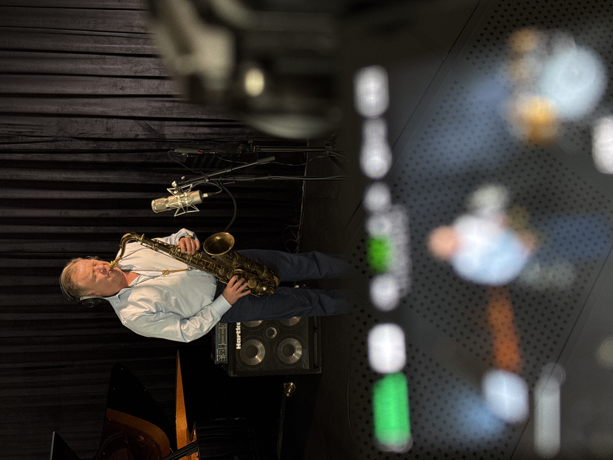 Saxophonist practices in Moscow music studio