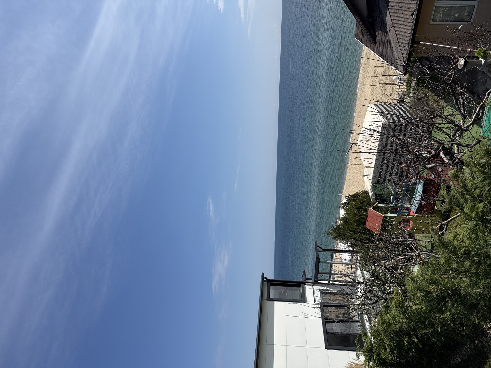 Beach scene documented in Varna, Bulgaria showing residential development