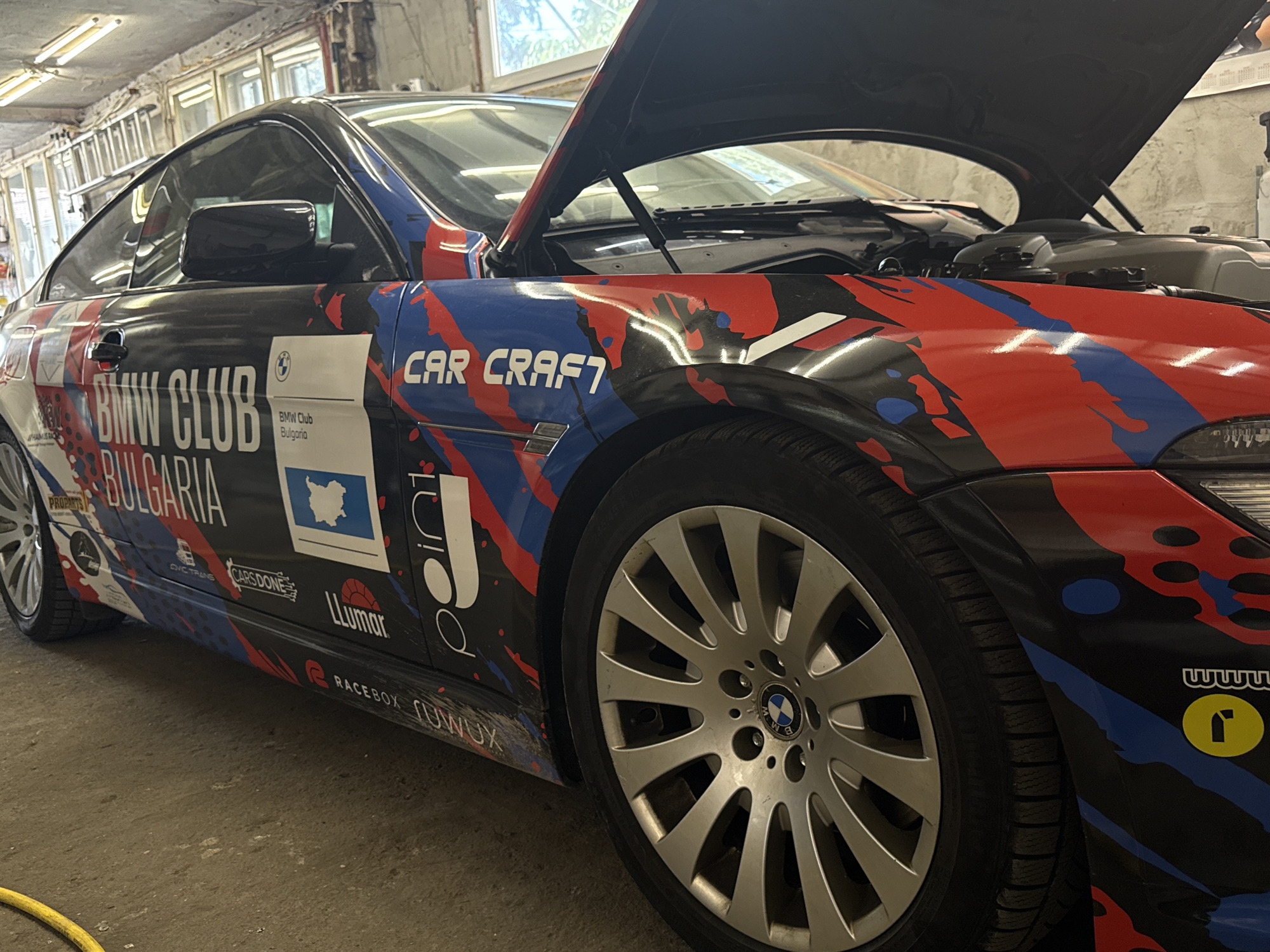 Modified BMW with custom wrap spotted in Sofia garage