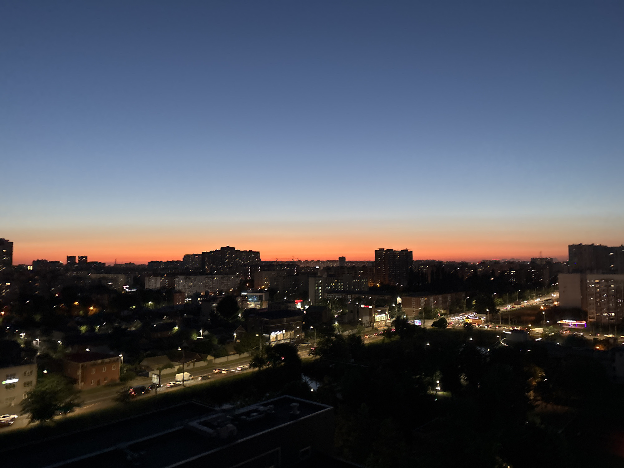 Krasnodar skyline at dusk, sky ablaze with sunset colors