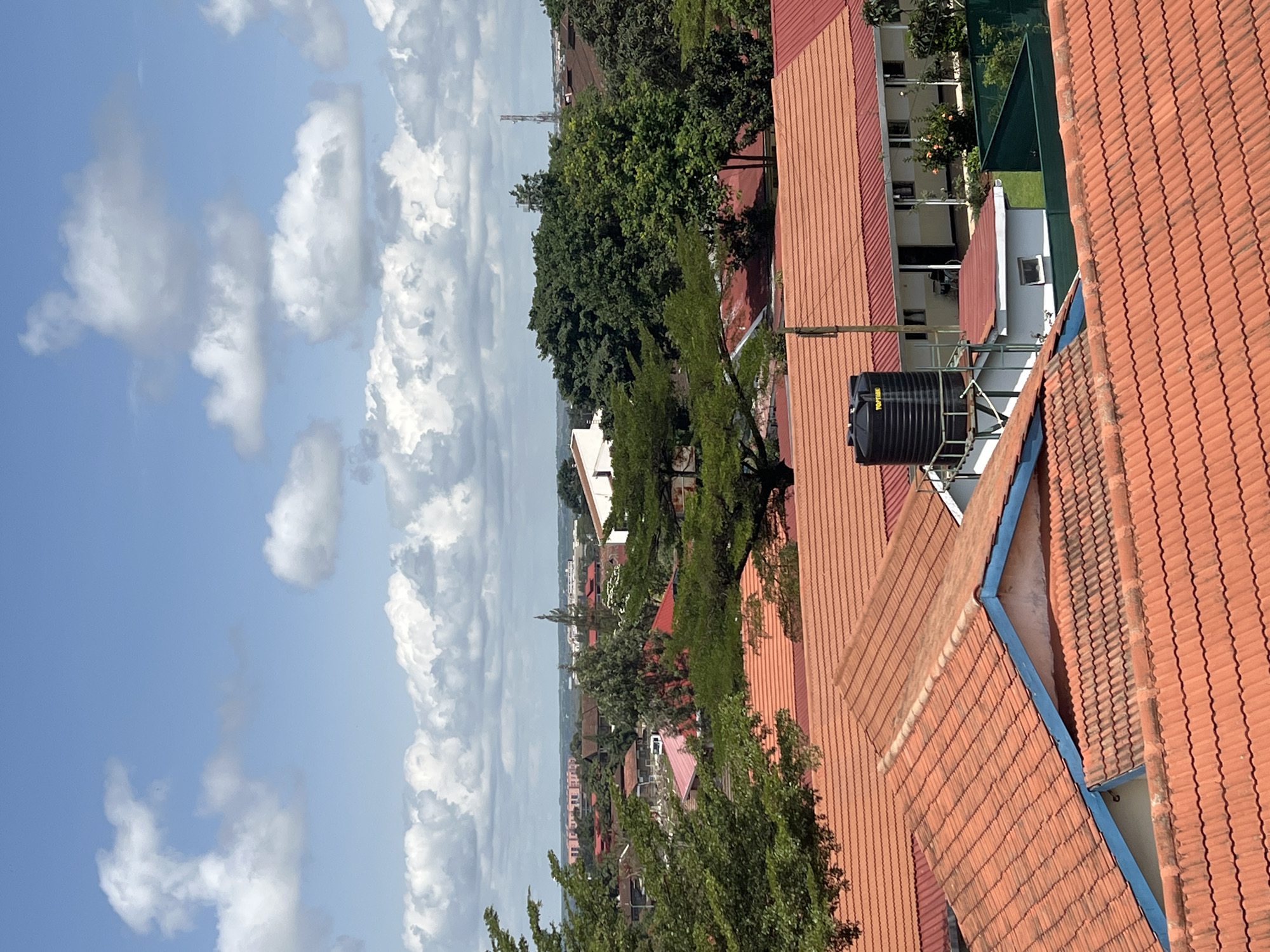 Small Aircraft Observed Landing Approach Over Nairobi Residential Area