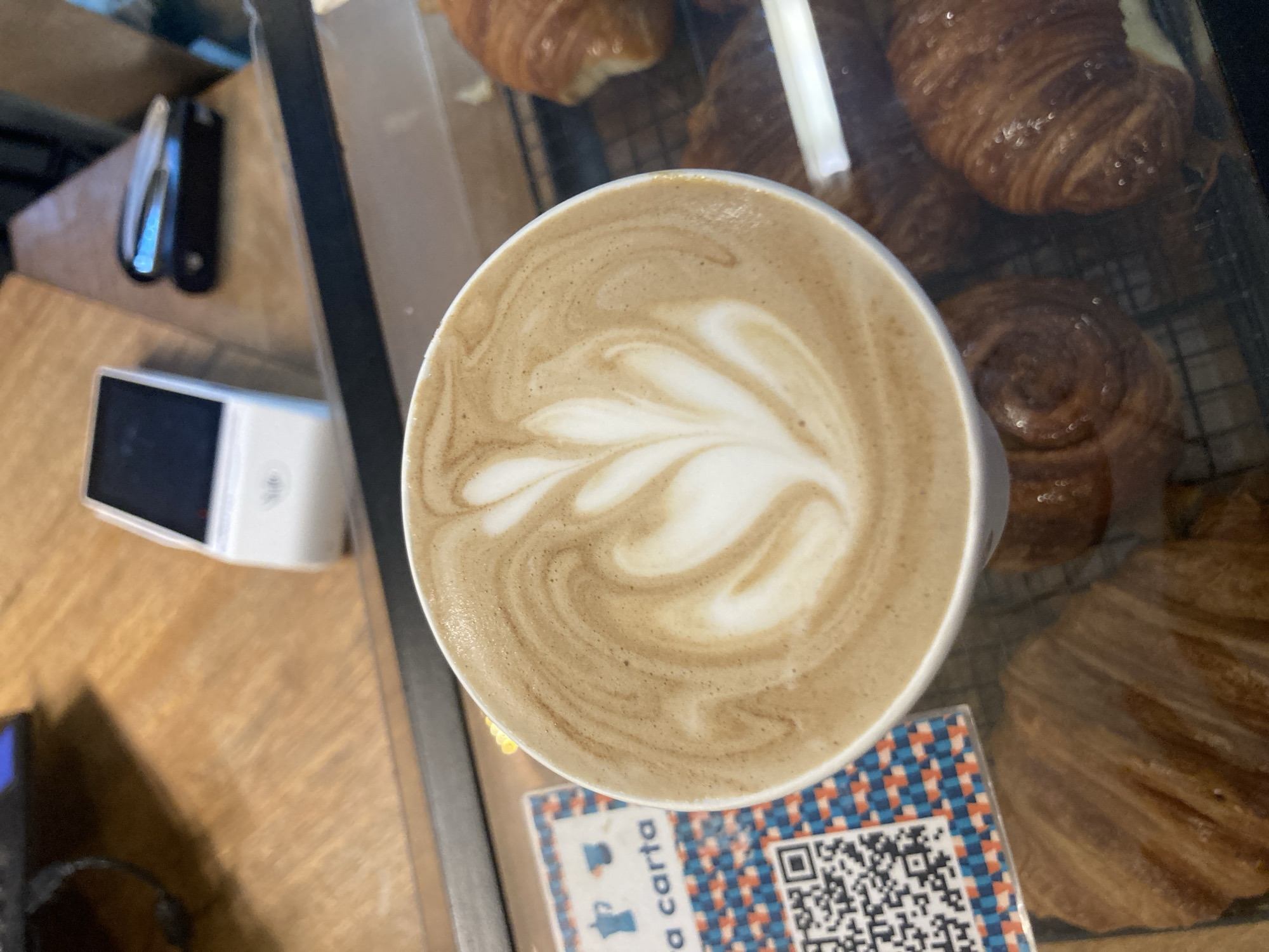 Intricate latte art captured in Buenos Aires coffee shop