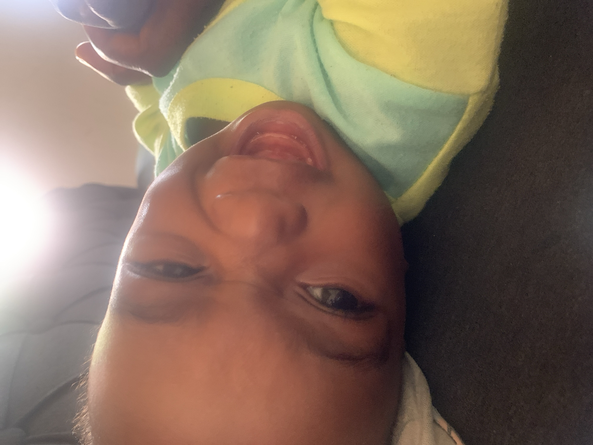 Baby photographed upside-down in Barakin Akawo, Nigeria