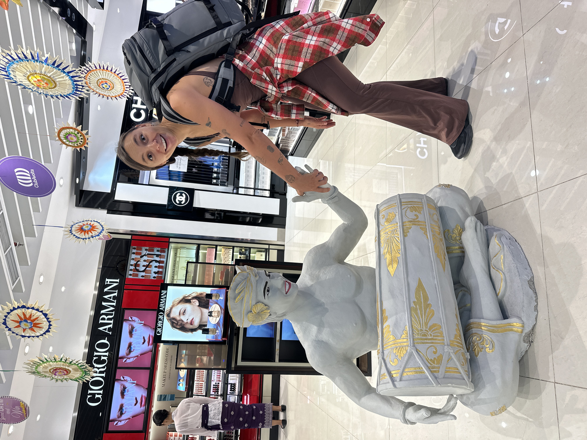 Late-night tourist activity documented at Bali's international airport