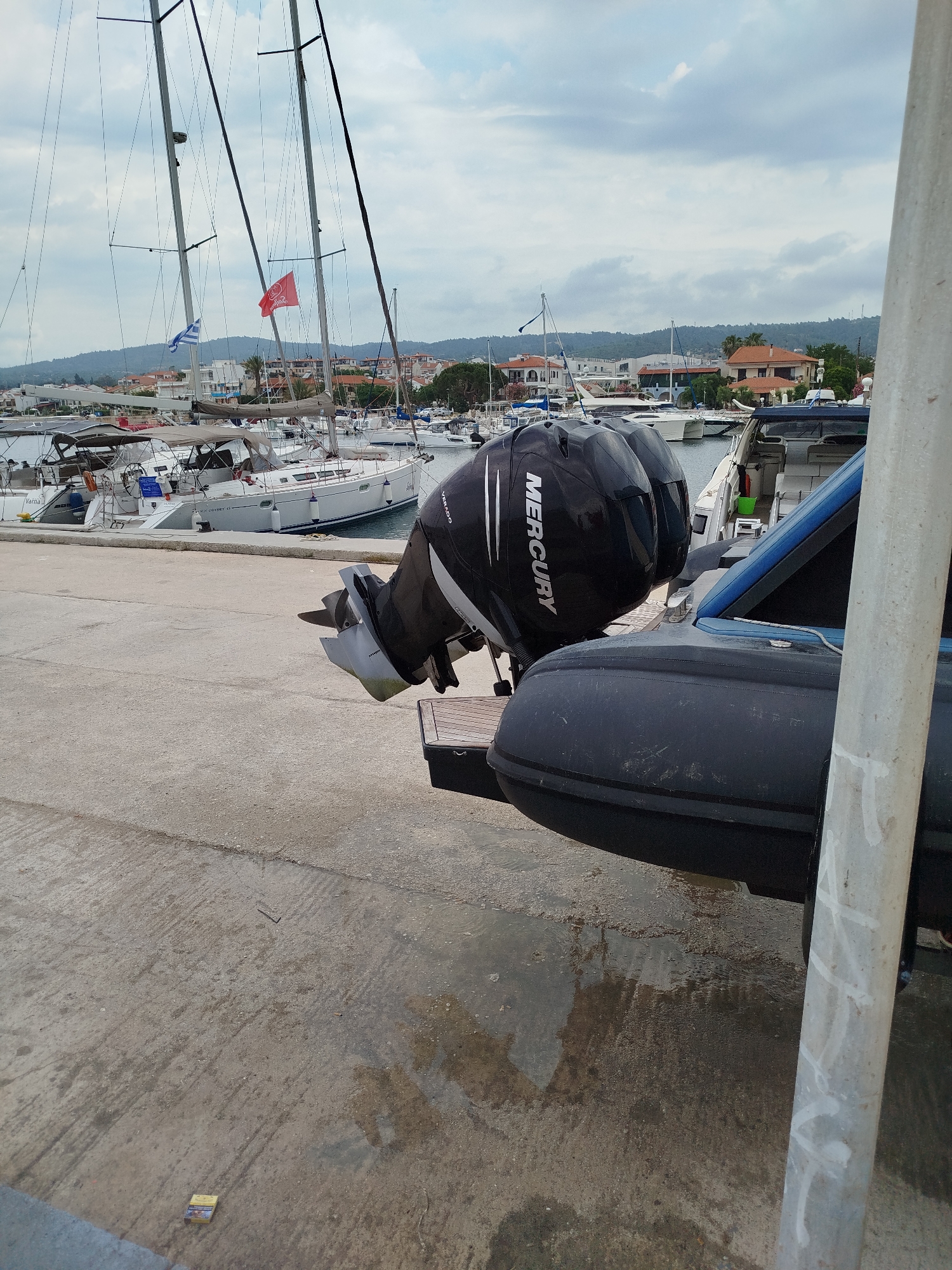 Morning marina scenes documented in Sithonia, Greece under cloudy skies