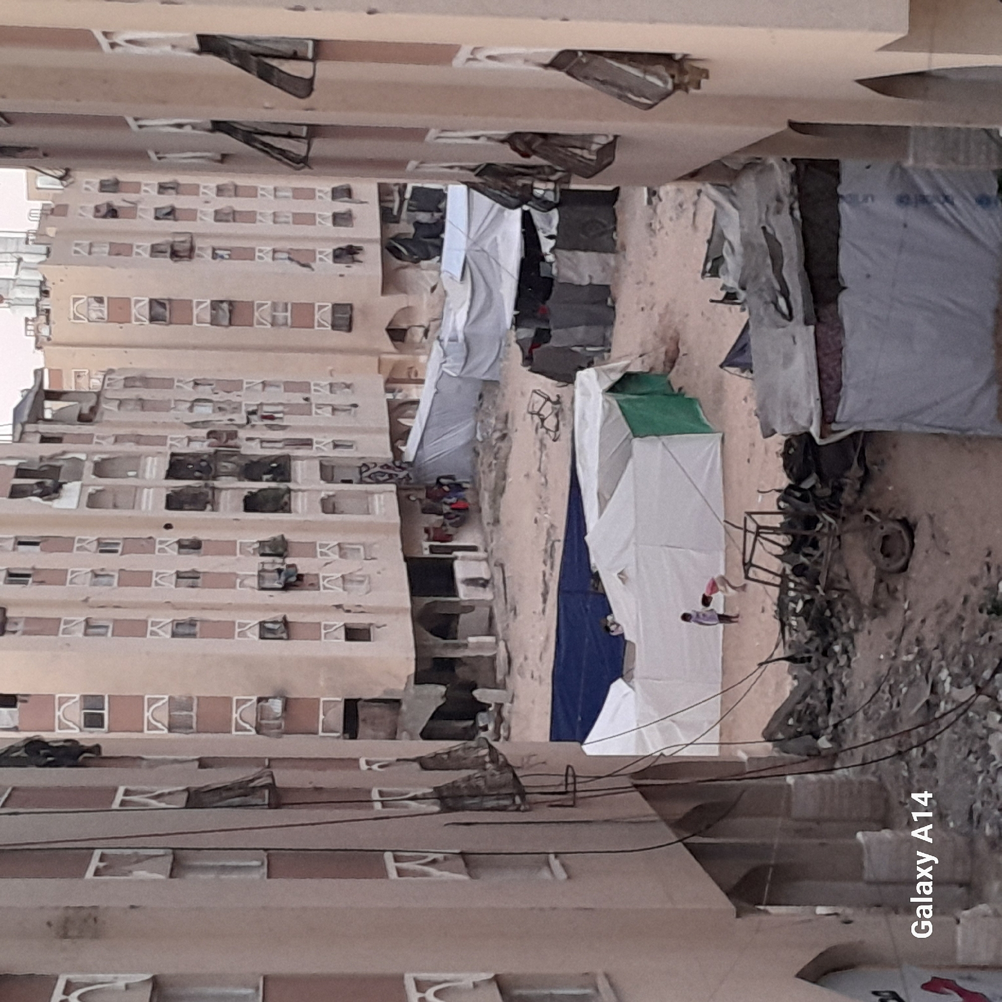 Children play in Khan Yunis streets amid ongoing displacement