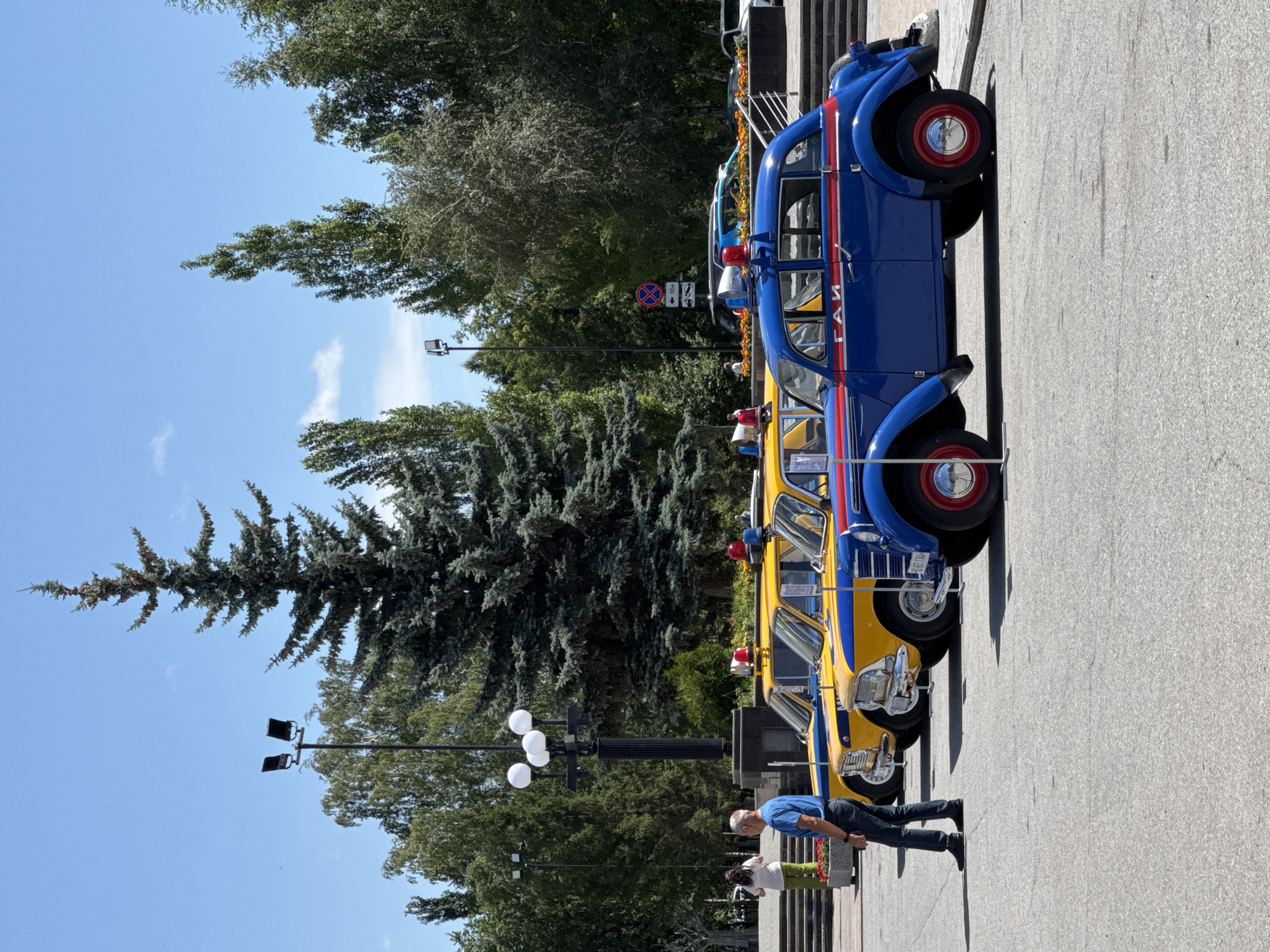 Vintage cars and retro police motorcycle on display in Omsk
