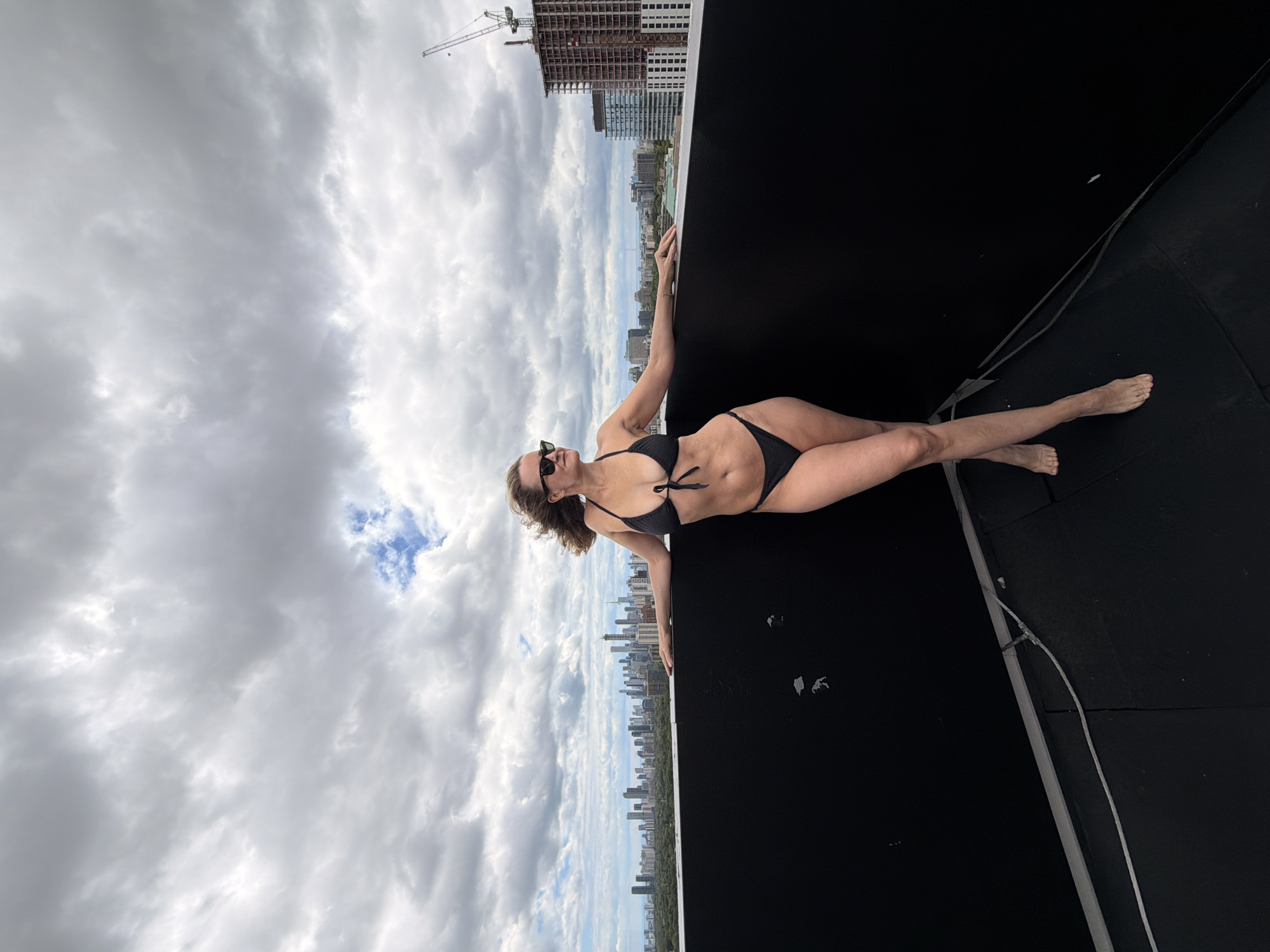 Rooftop pool day with Toronto skyline views