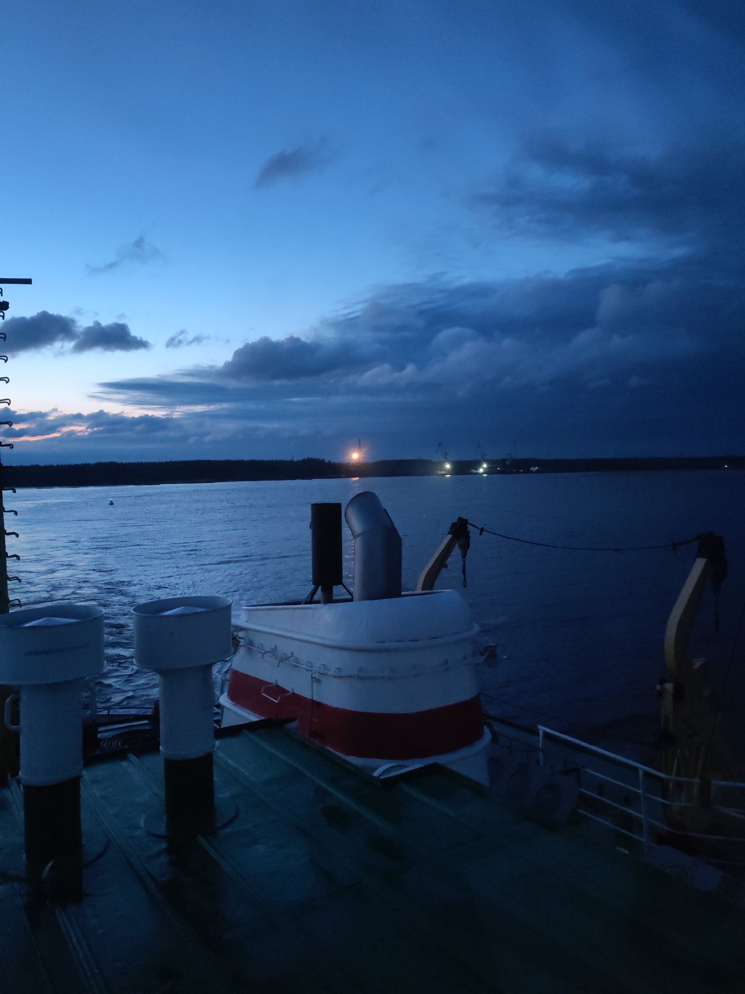 Ship passenger views sparse coastline near Shalsky, Russia