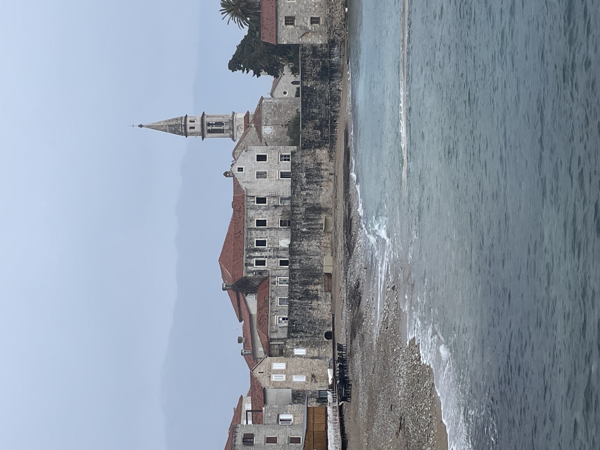 Tourist captures Budva's Old Town and famous ballerina statue