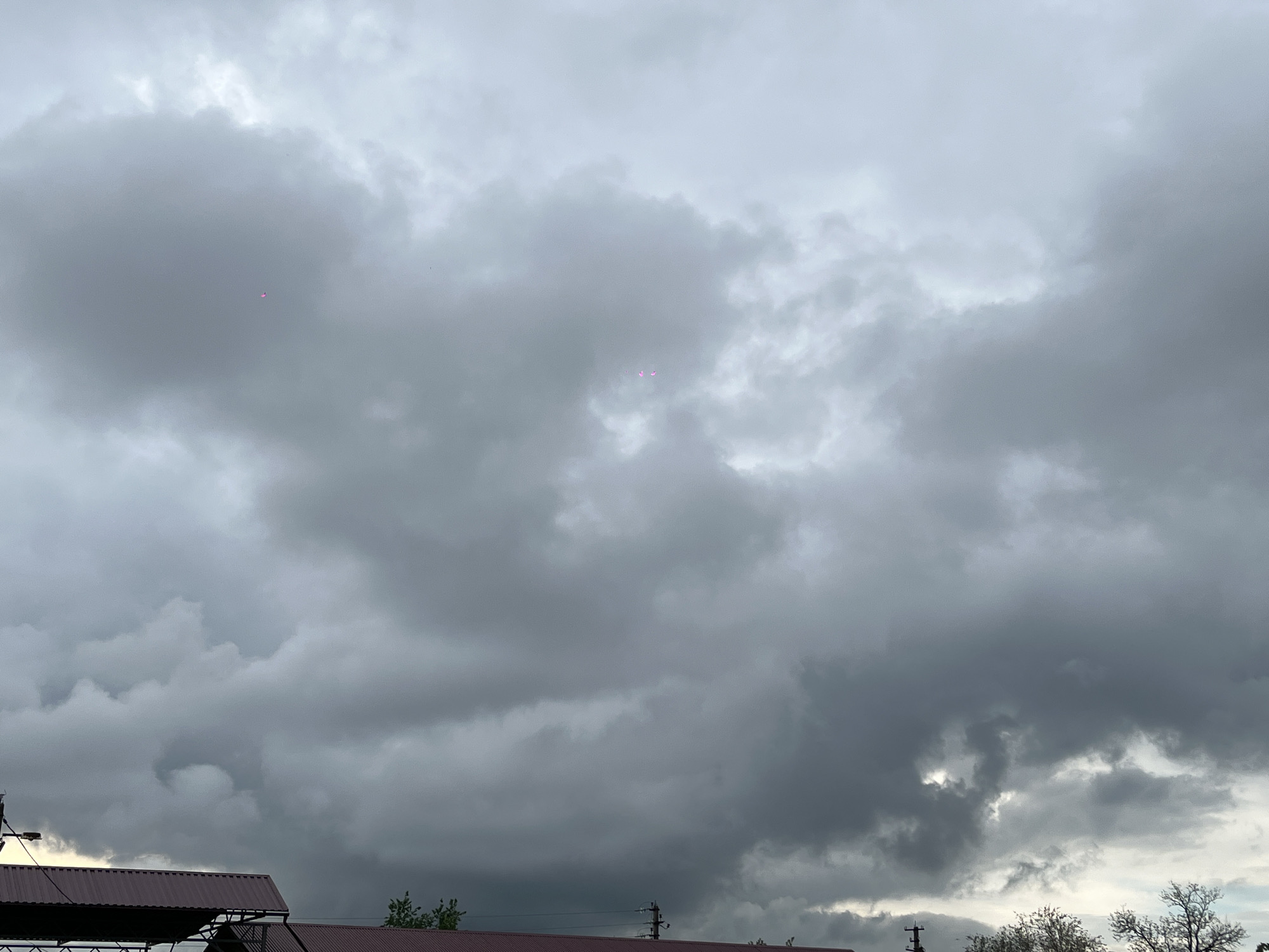 Stormy skies and casual portrait captured in Novopokrovskaya
