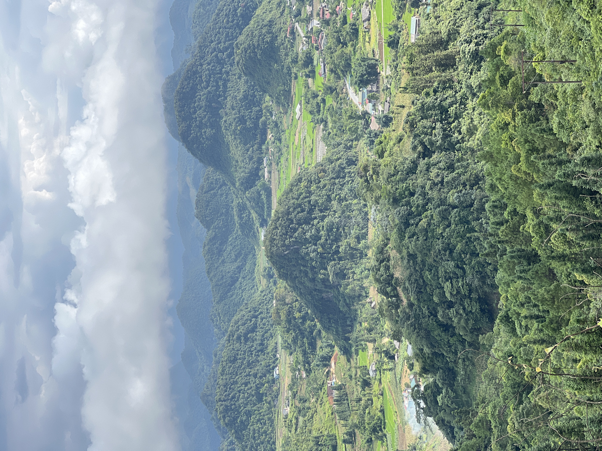 Panoramic views over Quản Bạ's layered green hills