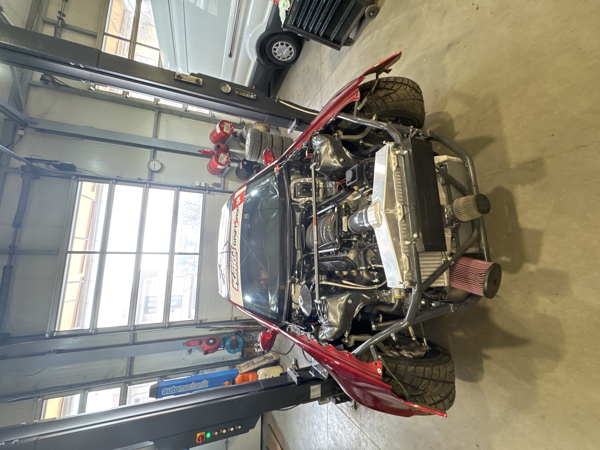 Modified car undergoes maintenance work in Sofia garage