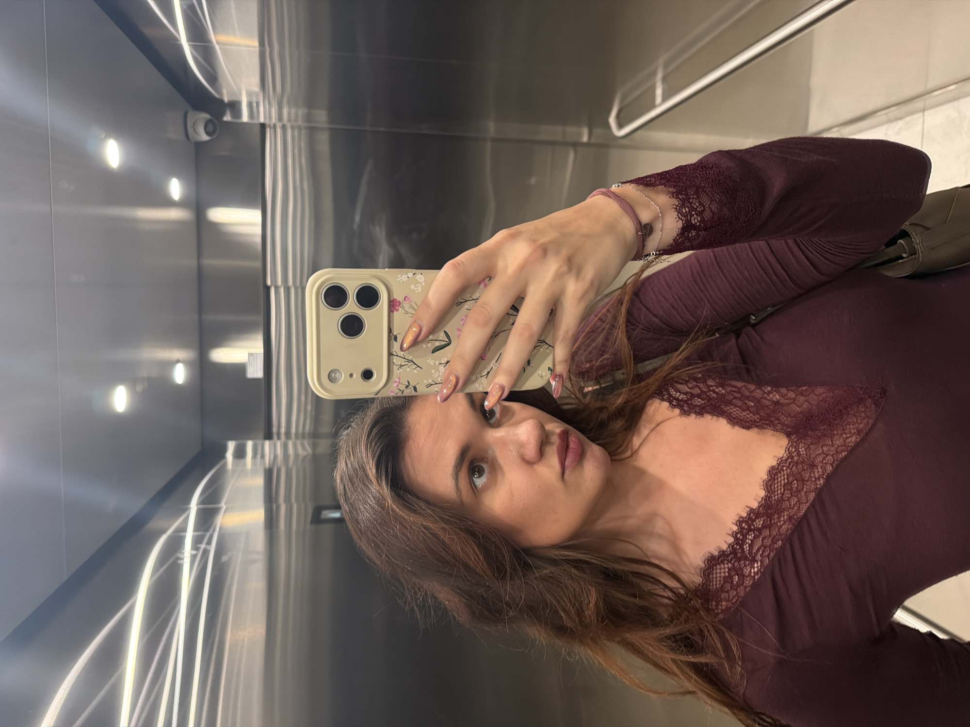 Woman Takes Selfie in Belgrade Elevator