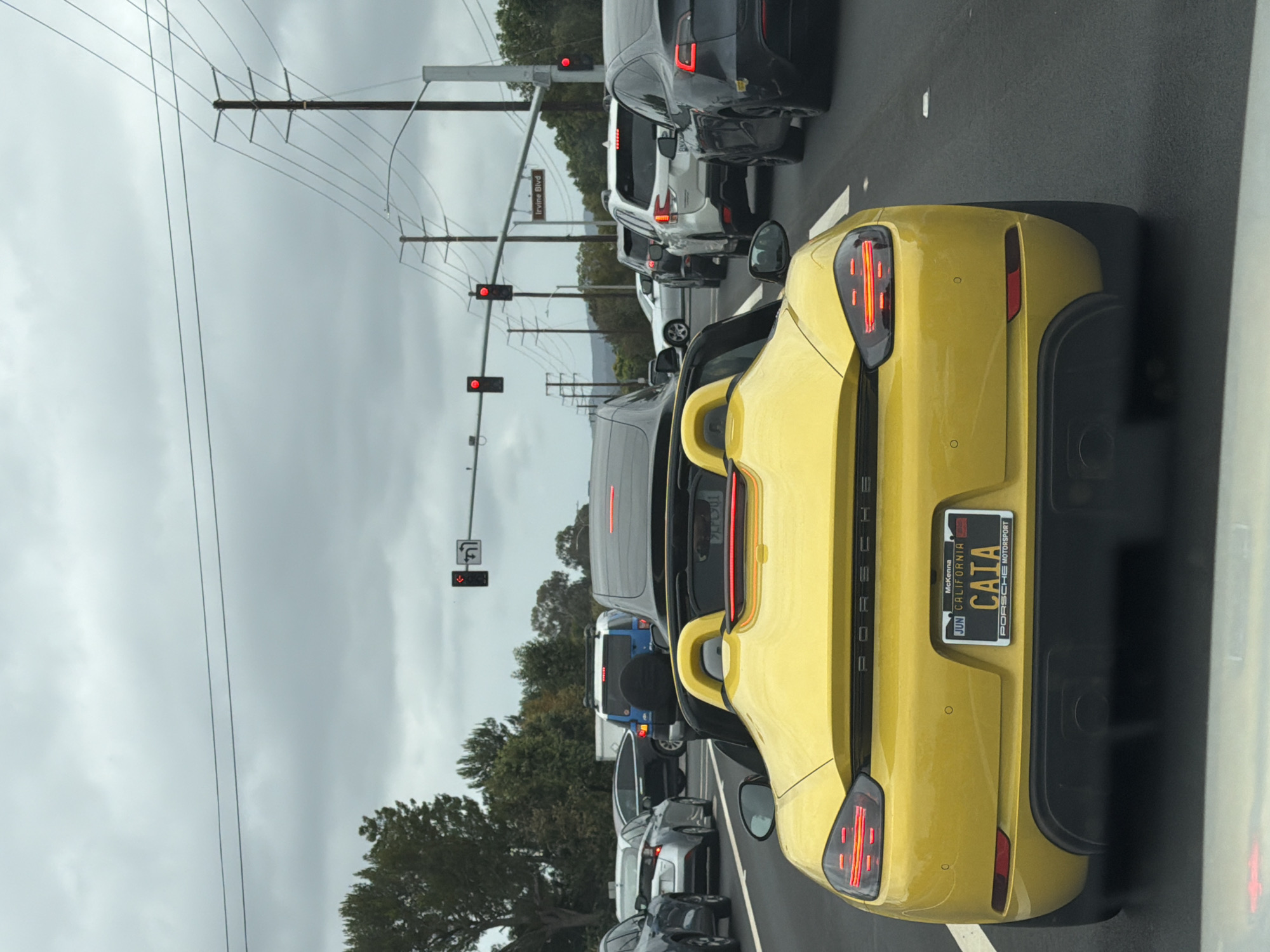 Yellow Porsche convertible spotted in Irvine highway traffic