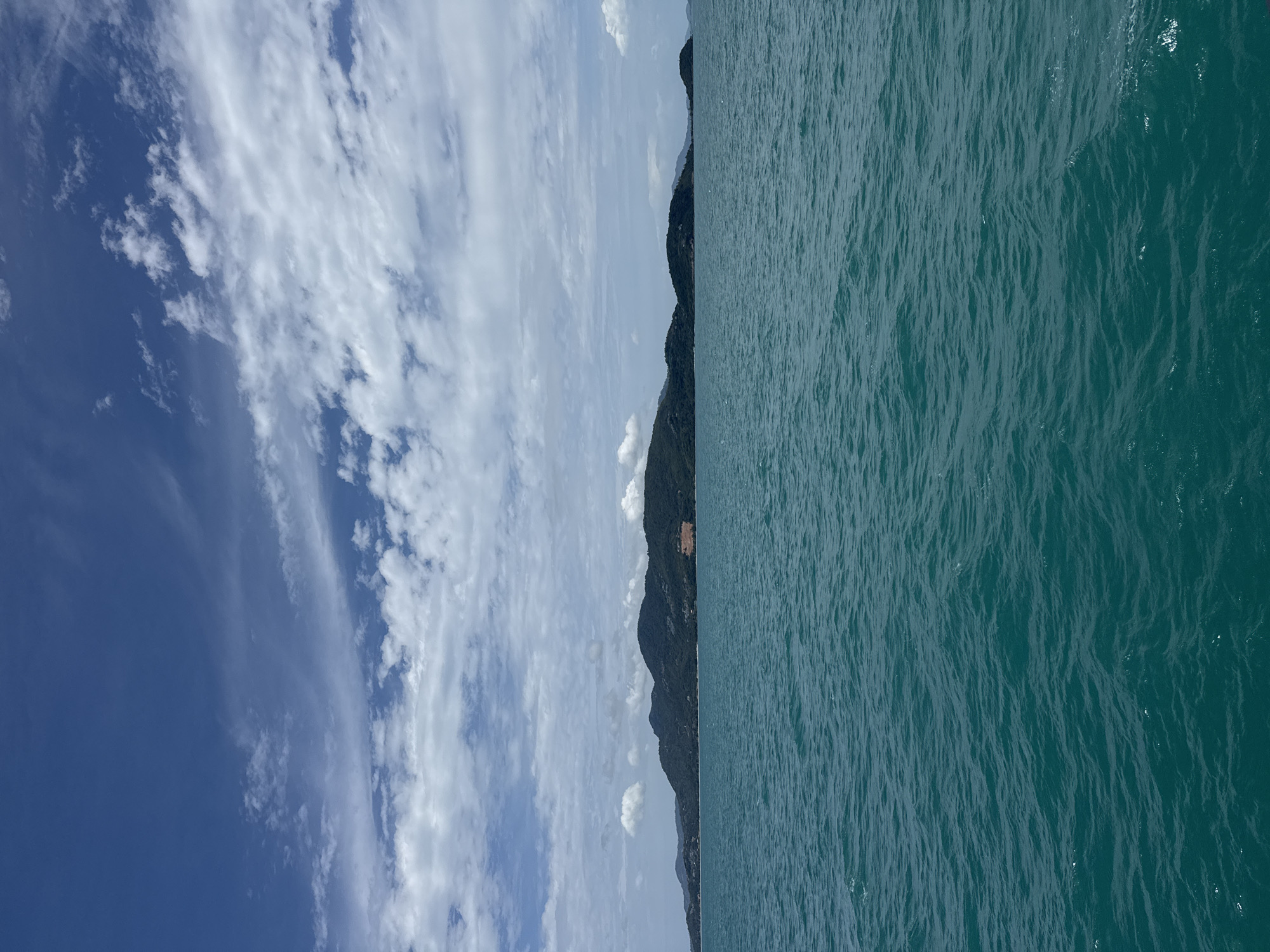 Floating in shallow surf off Ko Samui on a calm morning