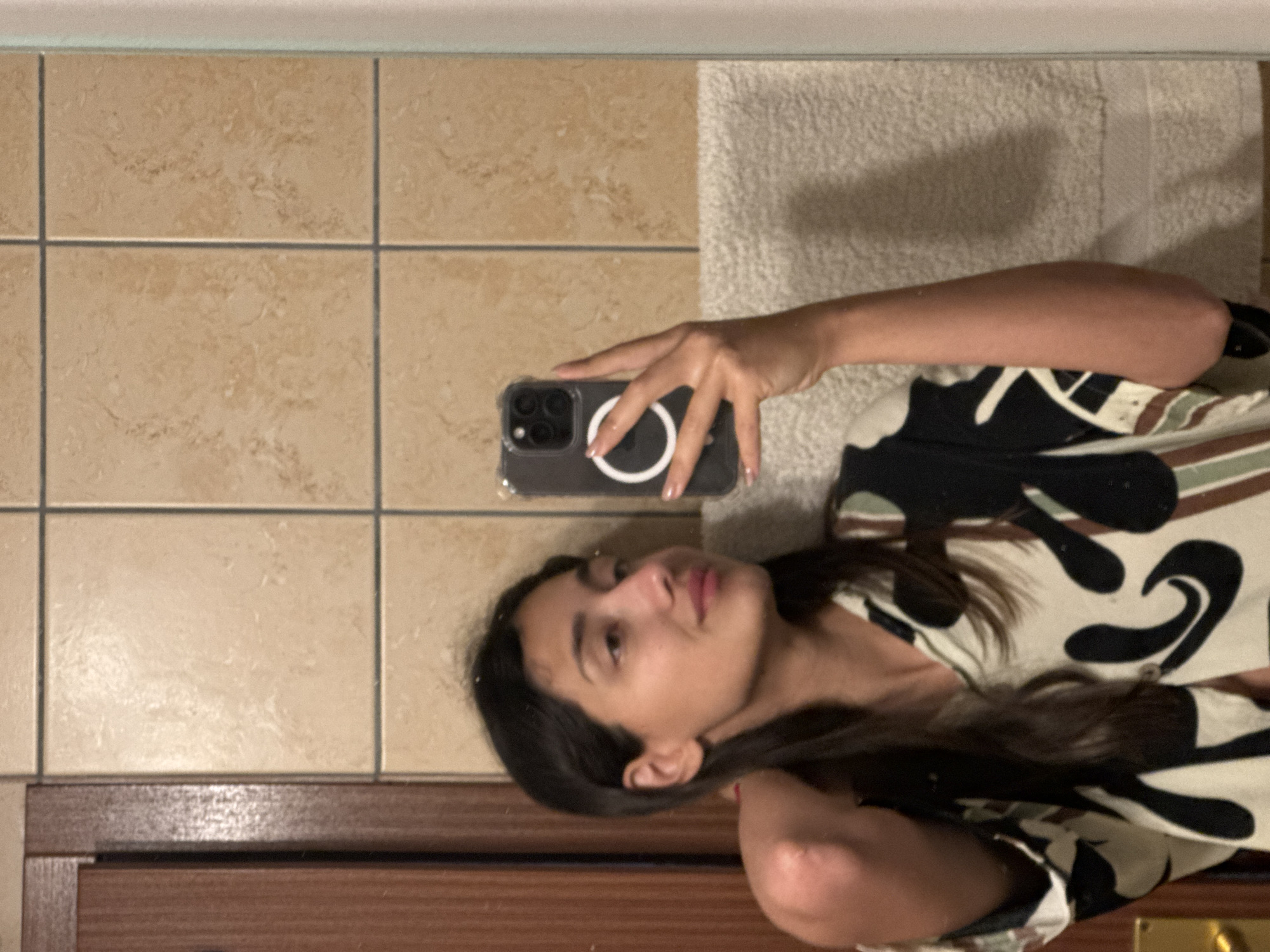 Woman takes bathroom selfie in Montenegro village