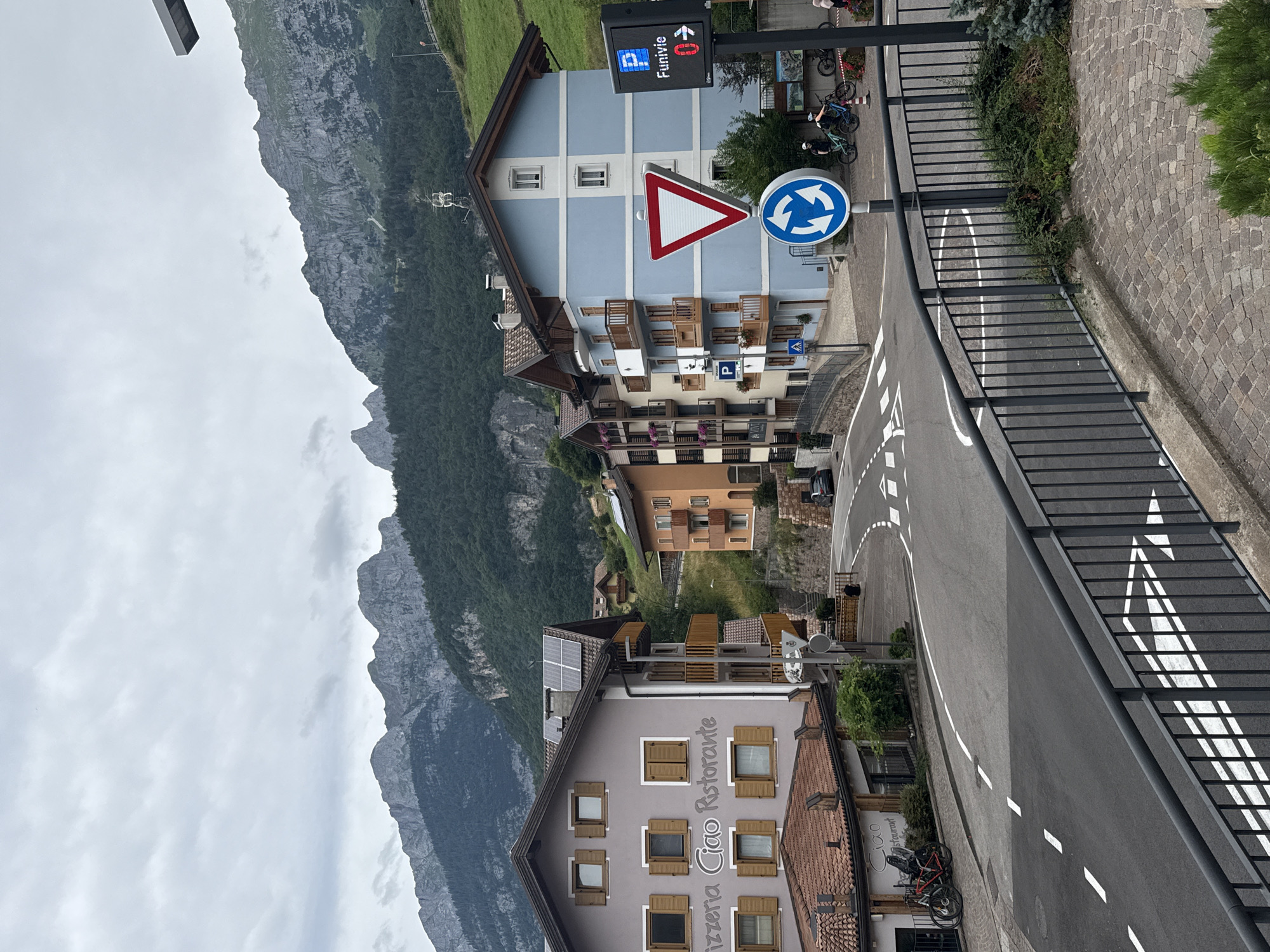 Summer morning around Molveno's lake, trails, and cable cars