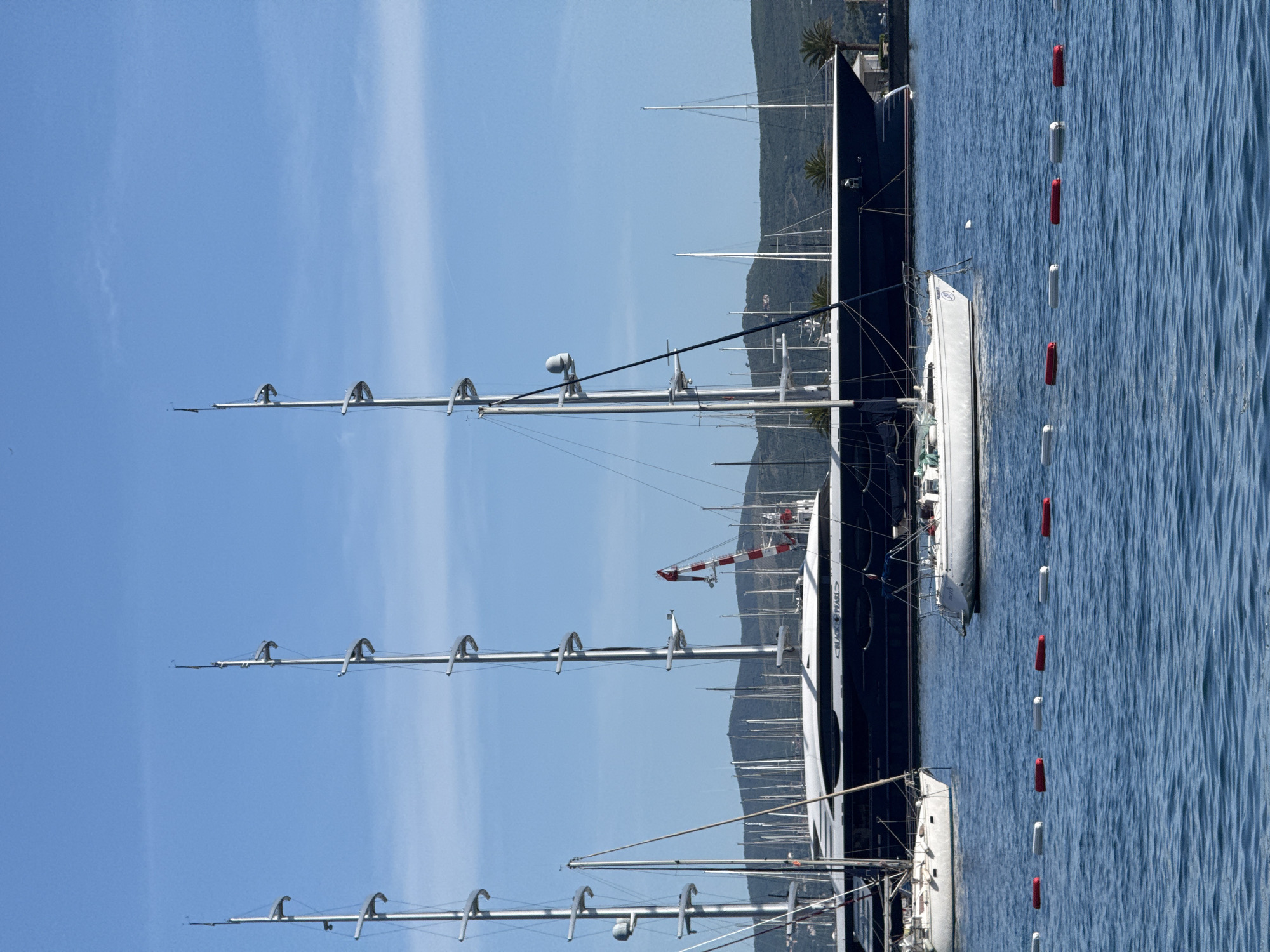 Busy boating day in Tivat harbor features superyacht, recreational vessels