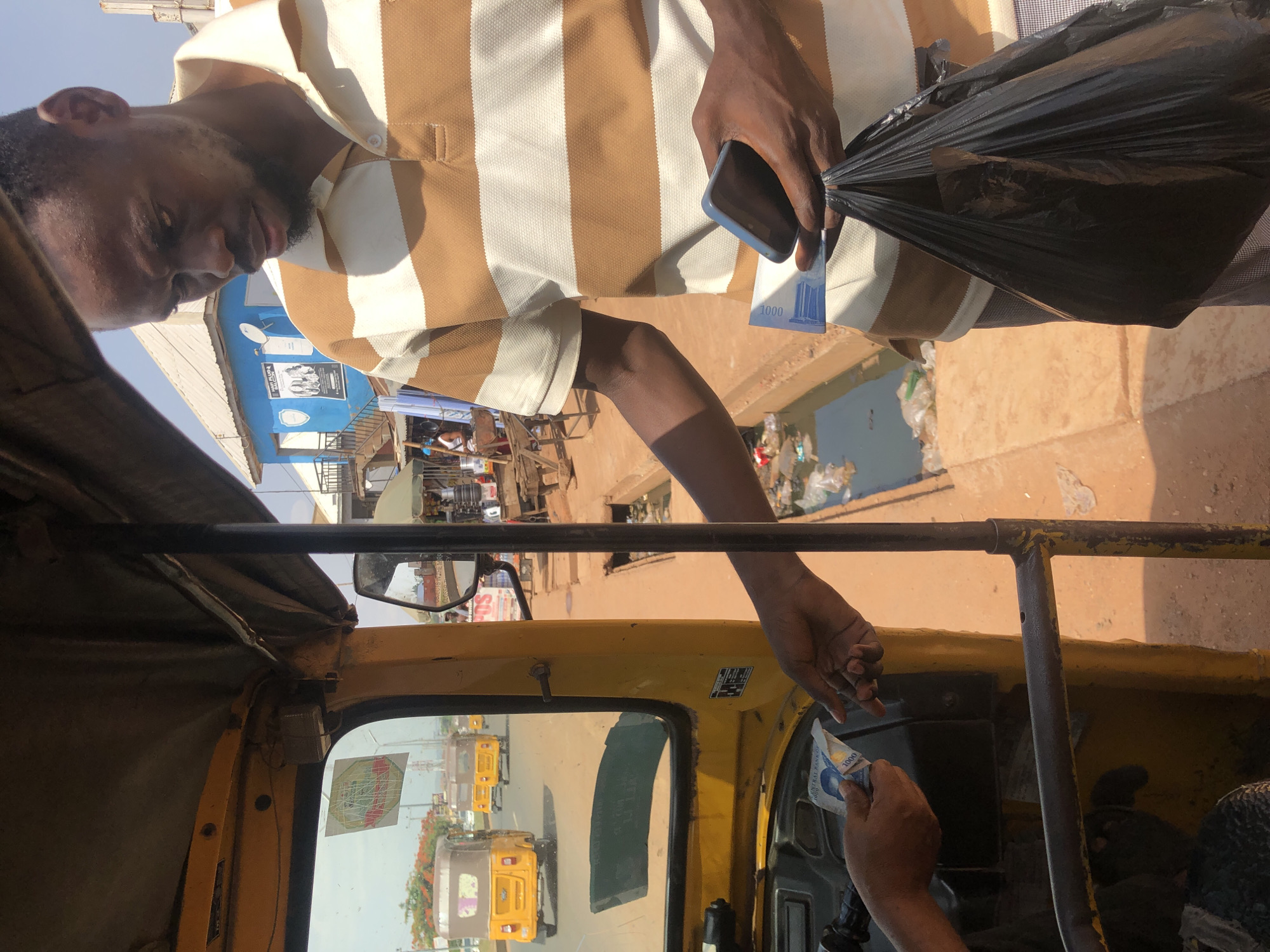 Street monetary exchange observed in commercial Abuja district