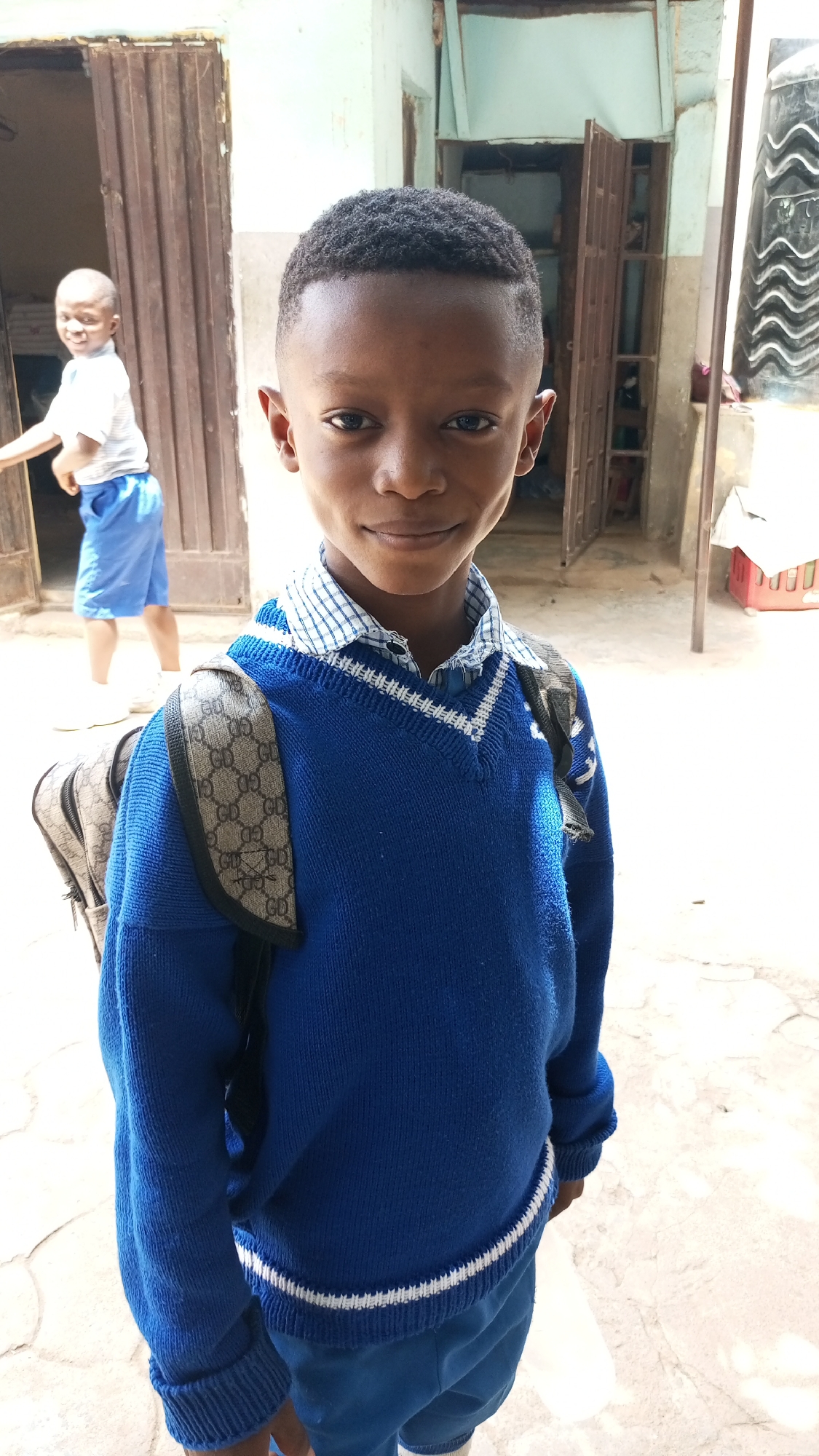 School children gather in courtyard, Sabon Tasha, Nigeria