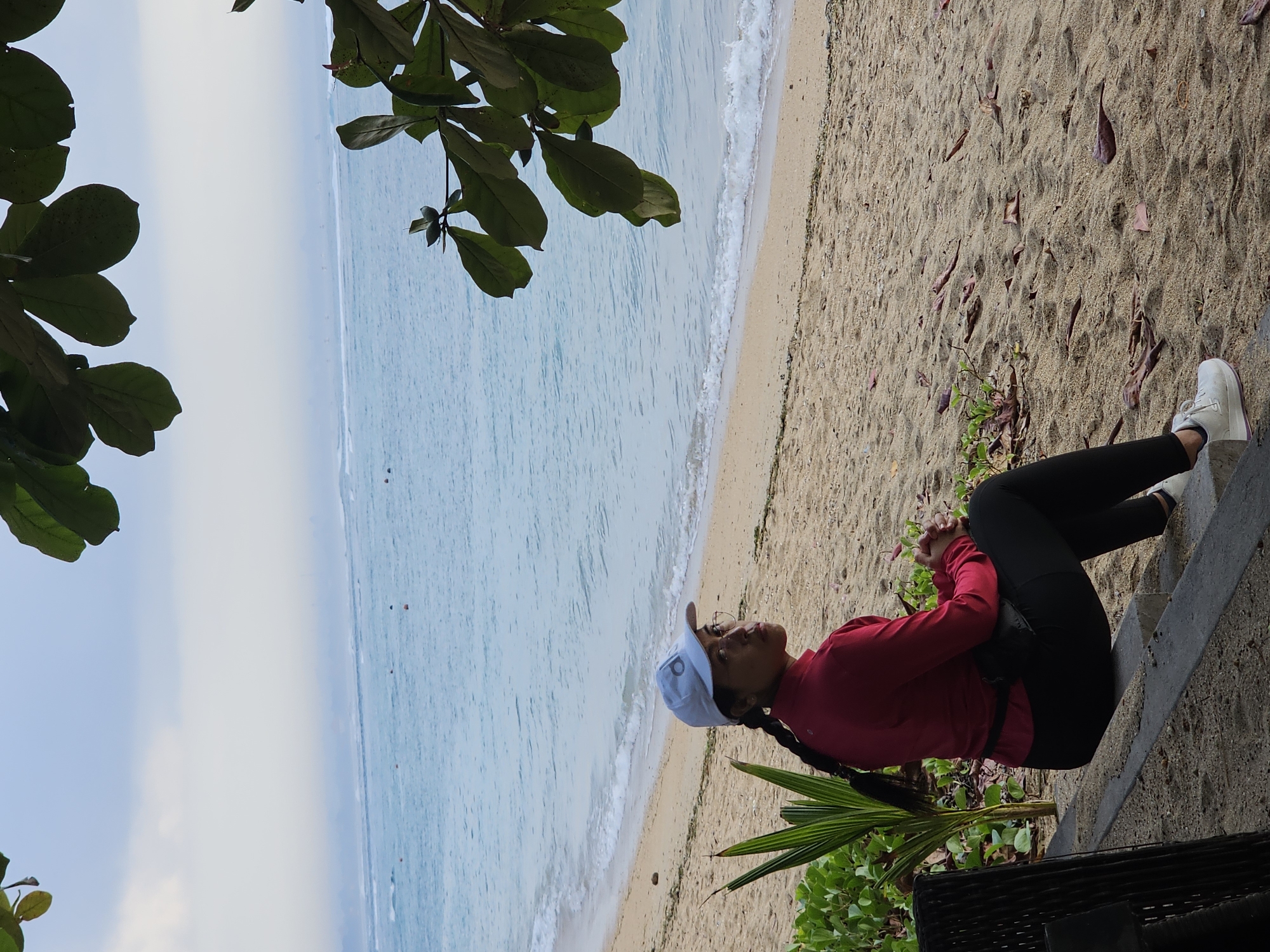 Cyclists and walkers share a breezy Denpasar beachside promenade