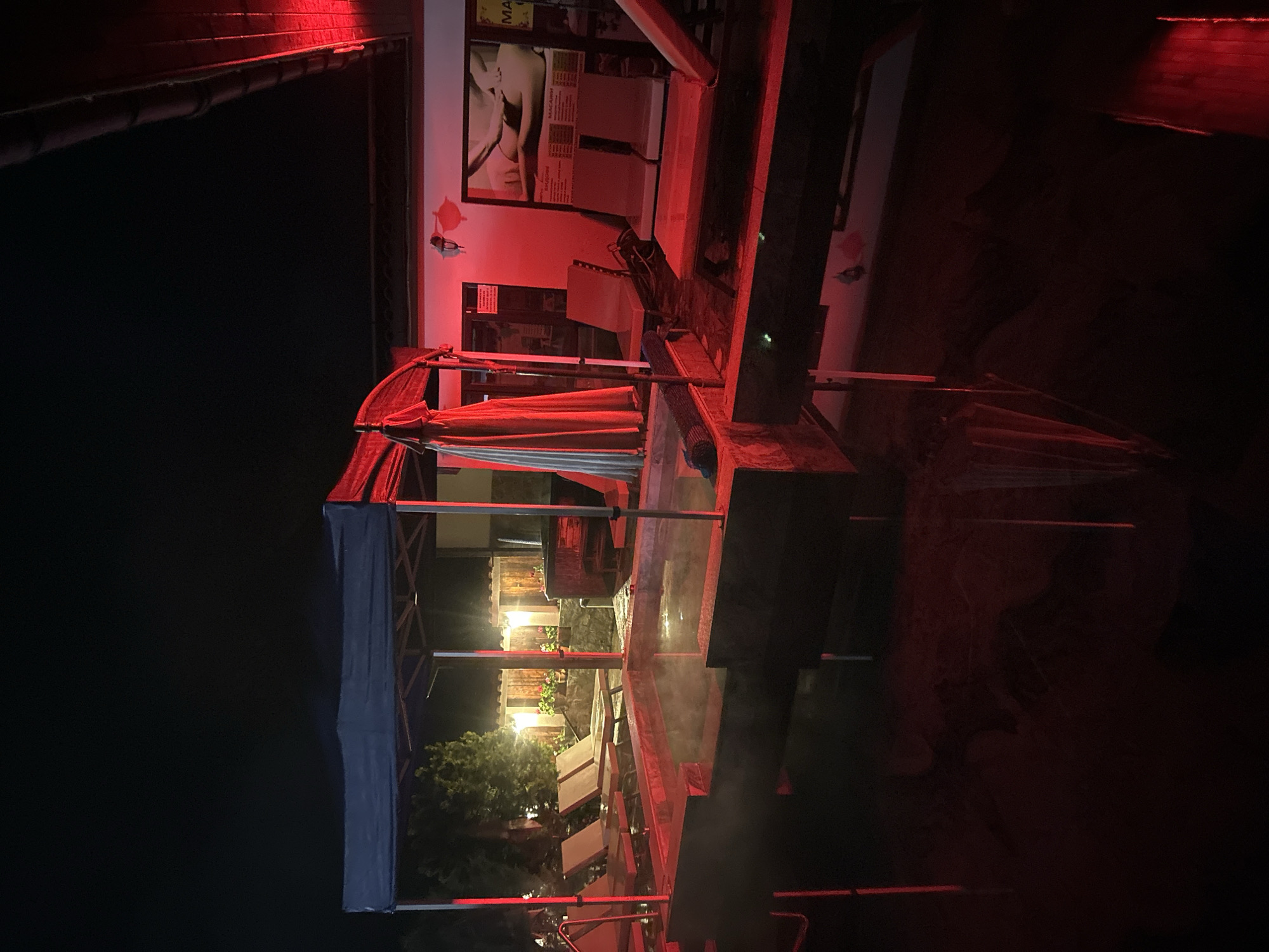 Empty thermal spa glows red at night in Bulgaria
